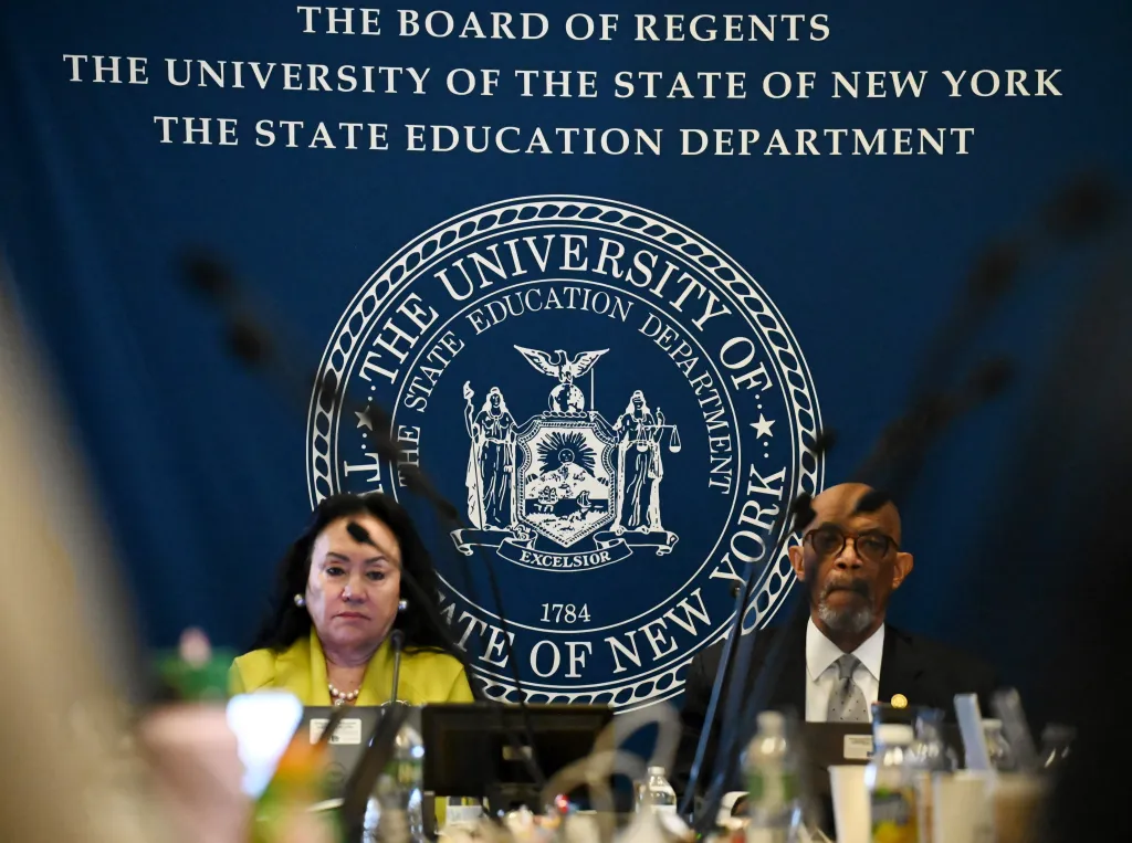 State Education Commissioner Betty Rosa and New York State Board of Regents Chancellor Lester Young Jr. preside over a meeting at the state Education Department.