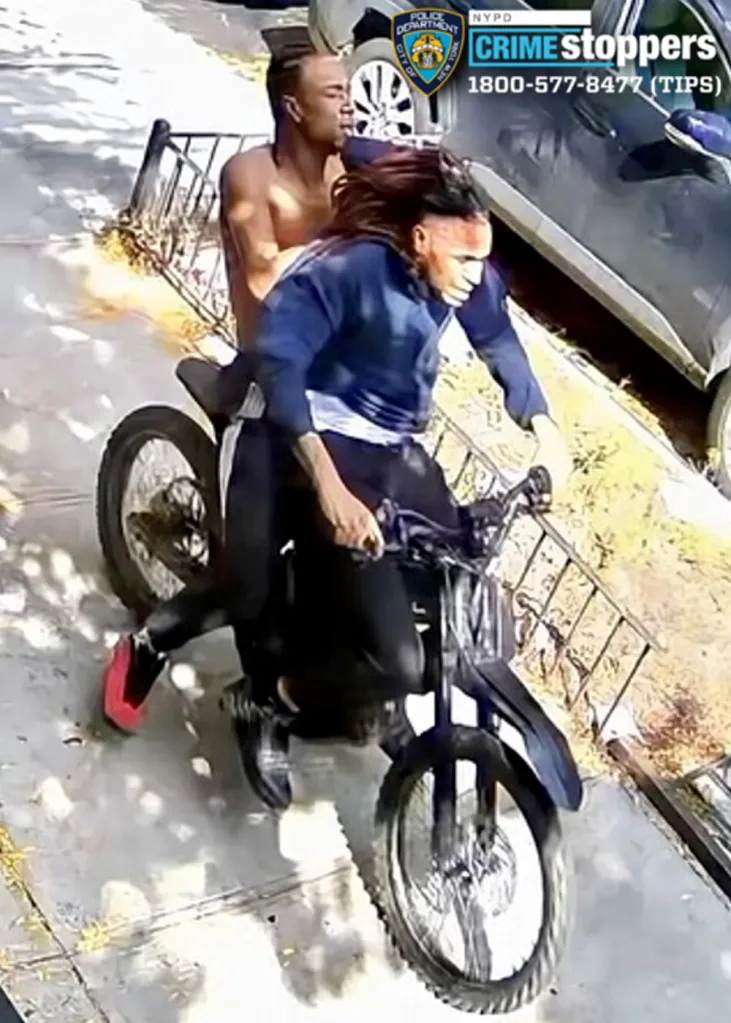 Two suspects wanted in connection with a robbery, riding a motorized bike.