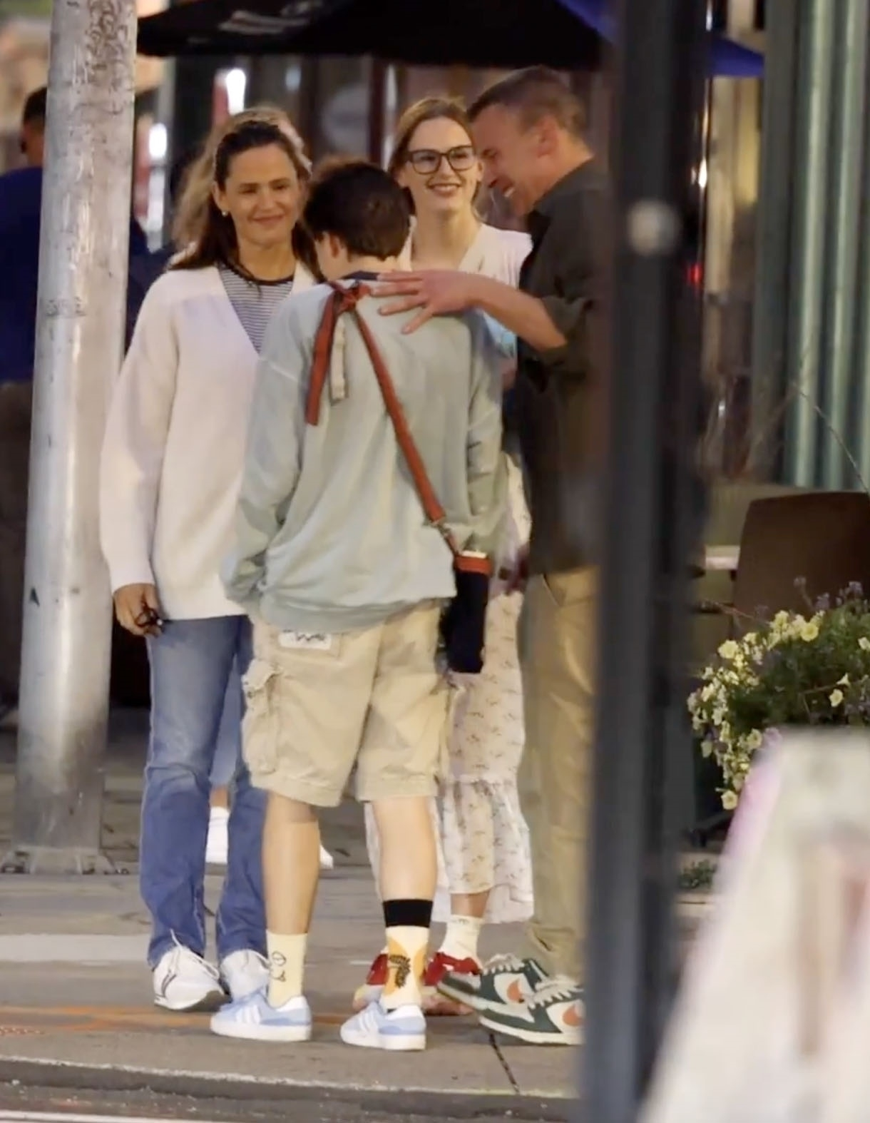 Ben Affleck, Jennifer Garner, Violet Affleck, and Fin Affleck stand outside together near Yale.