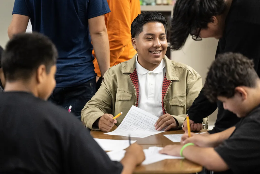 High school students work together during world history class at Anaheim High School.