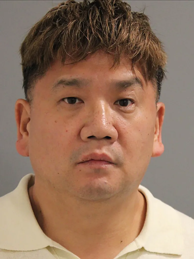 Police booking photo of Jin Chang.