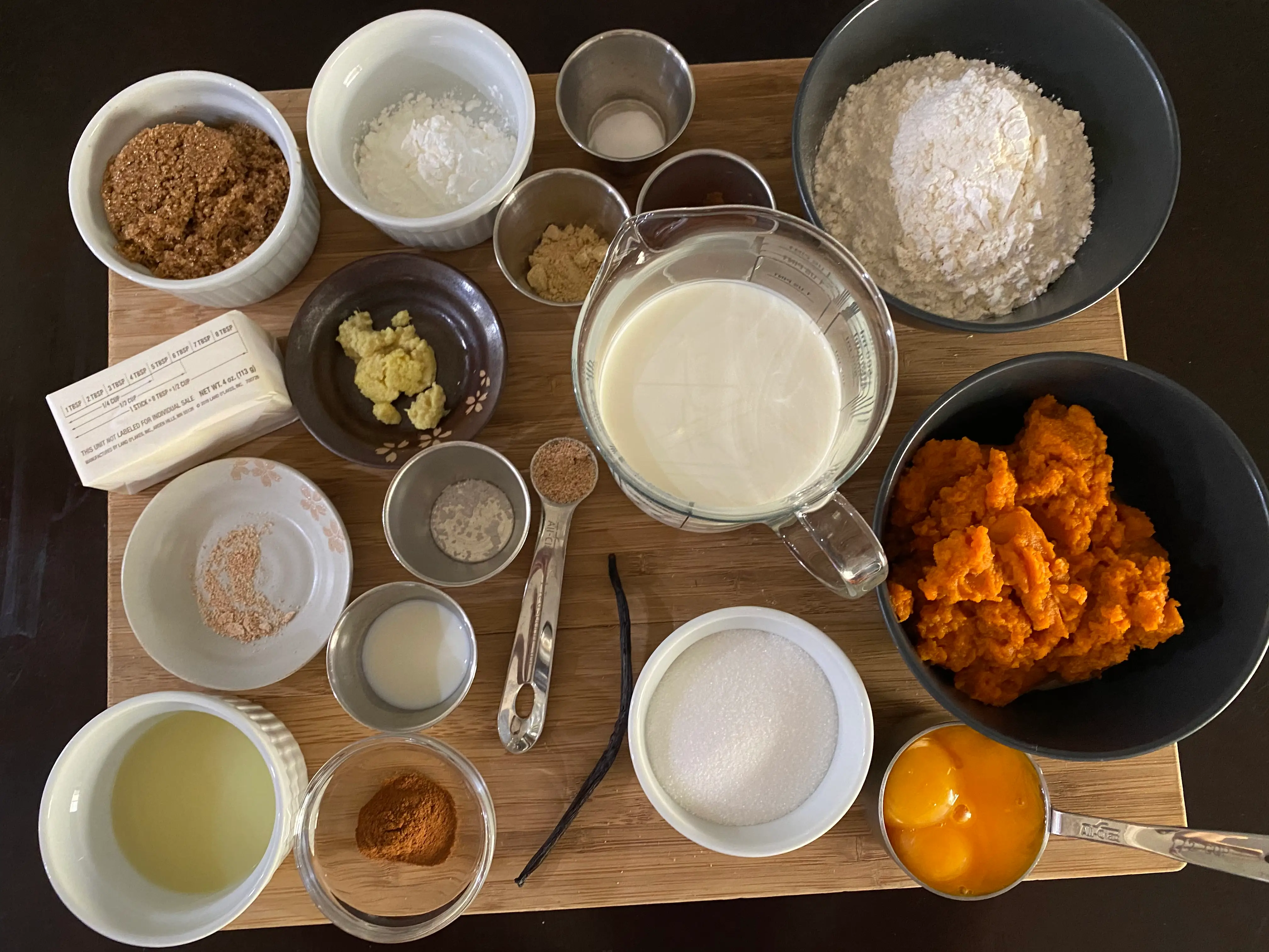 Dominique Ansel pumpkin pie  ingredients on. cutting board