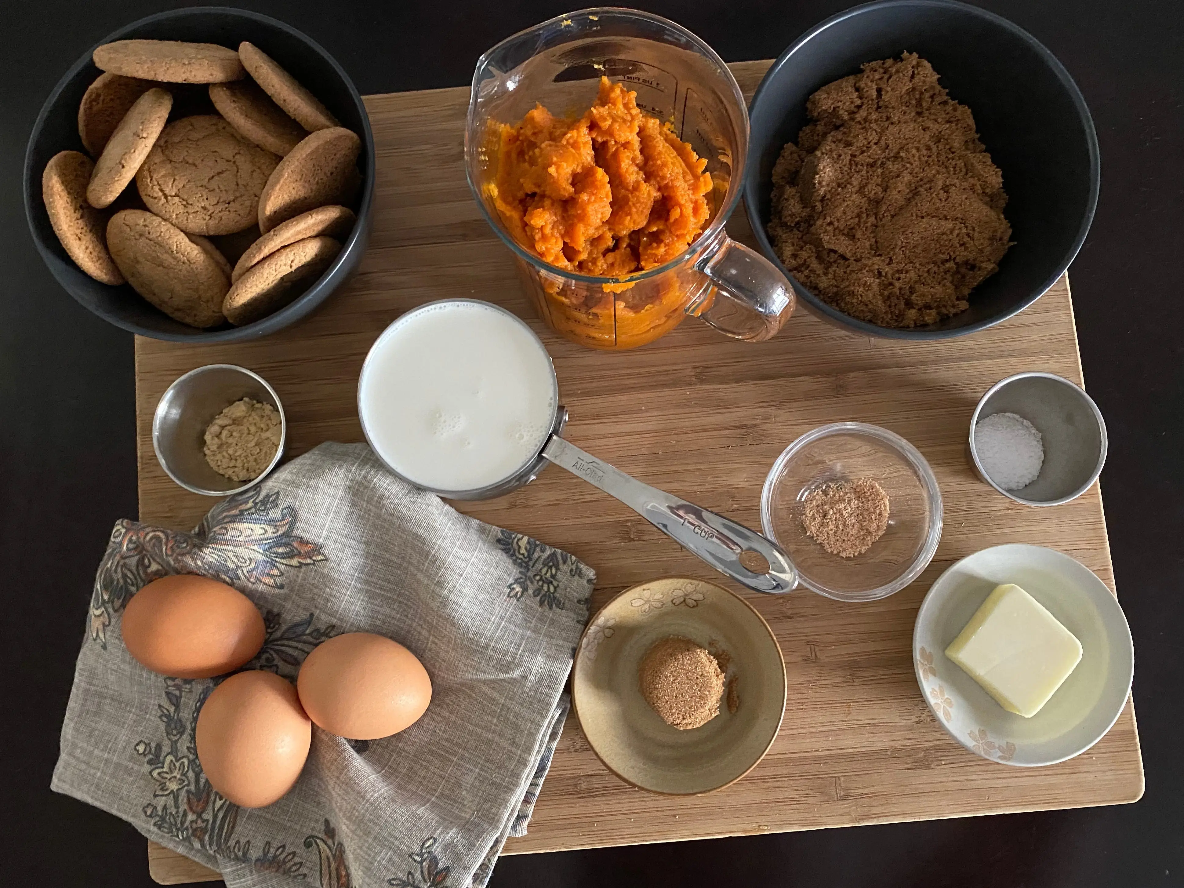 Alton Brown ingredients for pumpkin pie on cutting board
