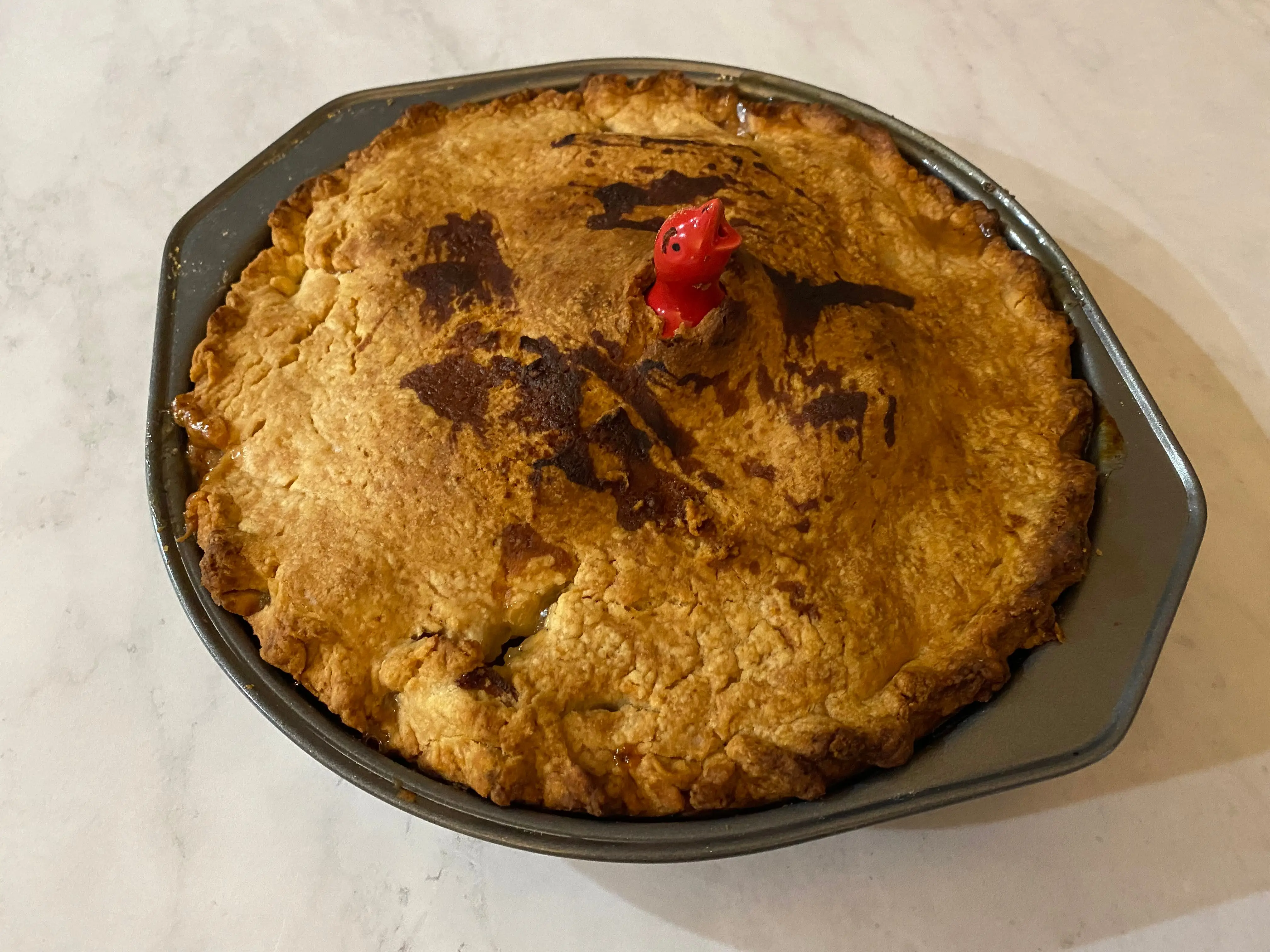 Alton Brown's apple pie in a tin.