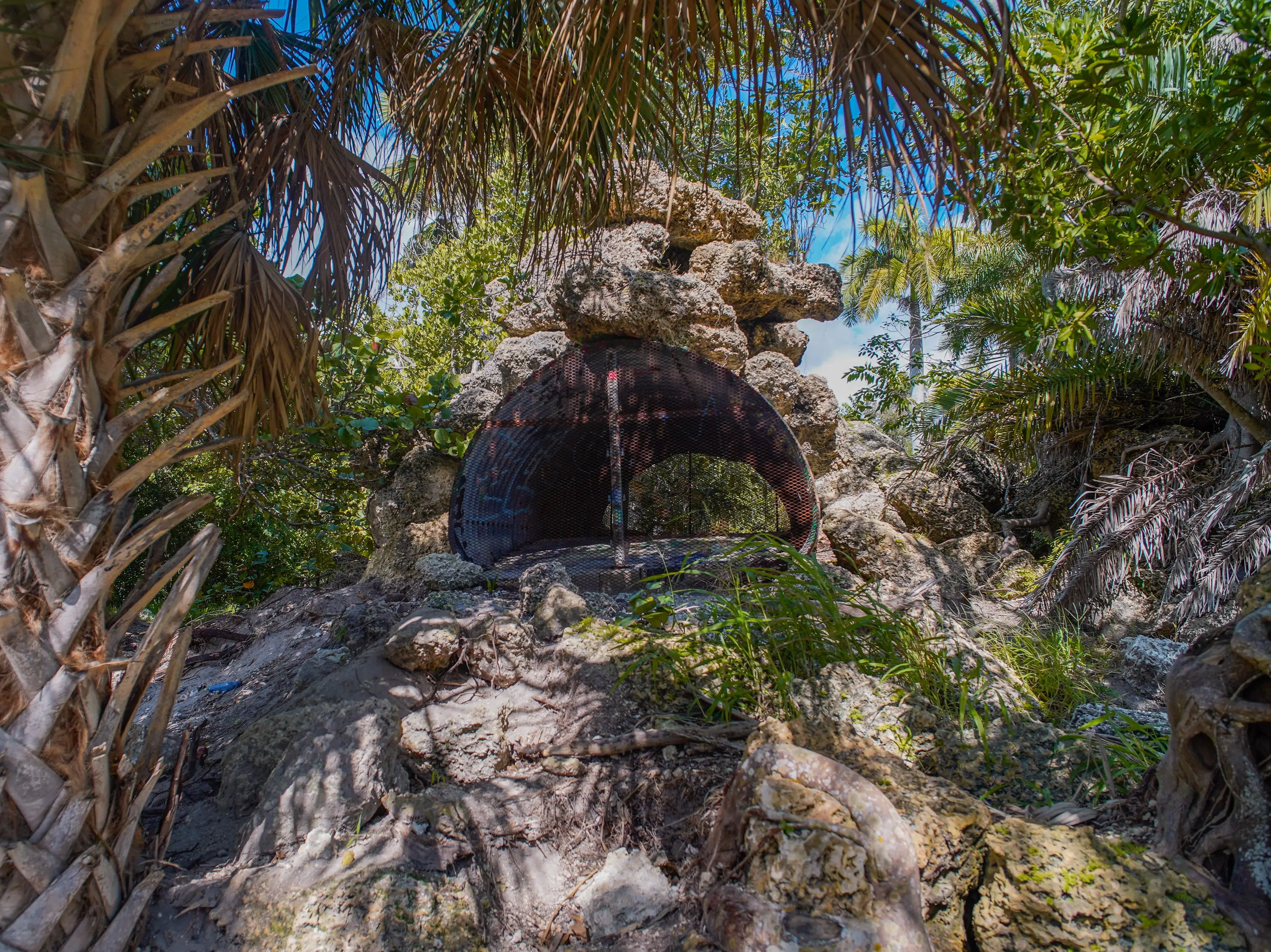 A cage in the zoo ruins