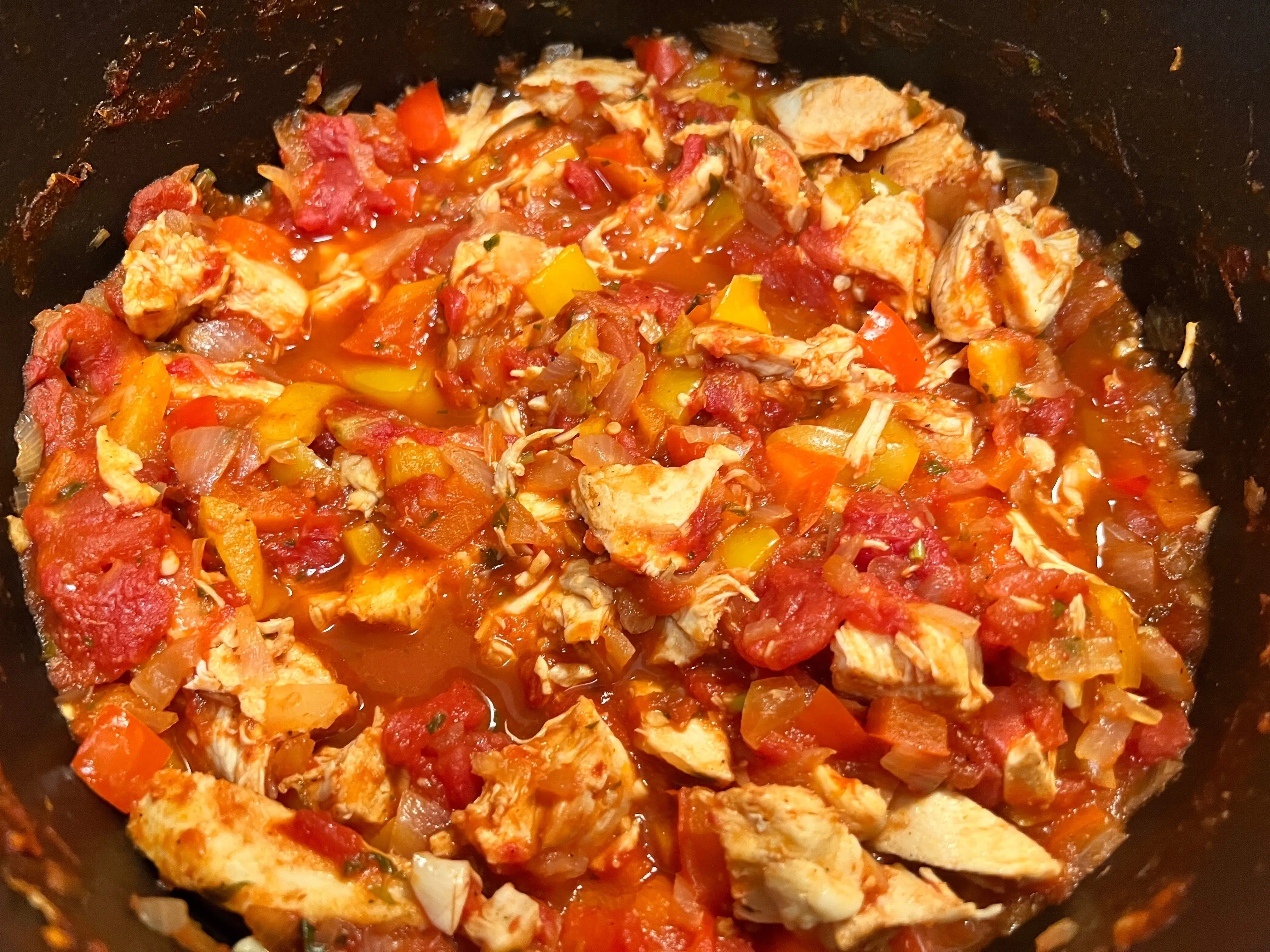 Chicken and vegetable chili in pot