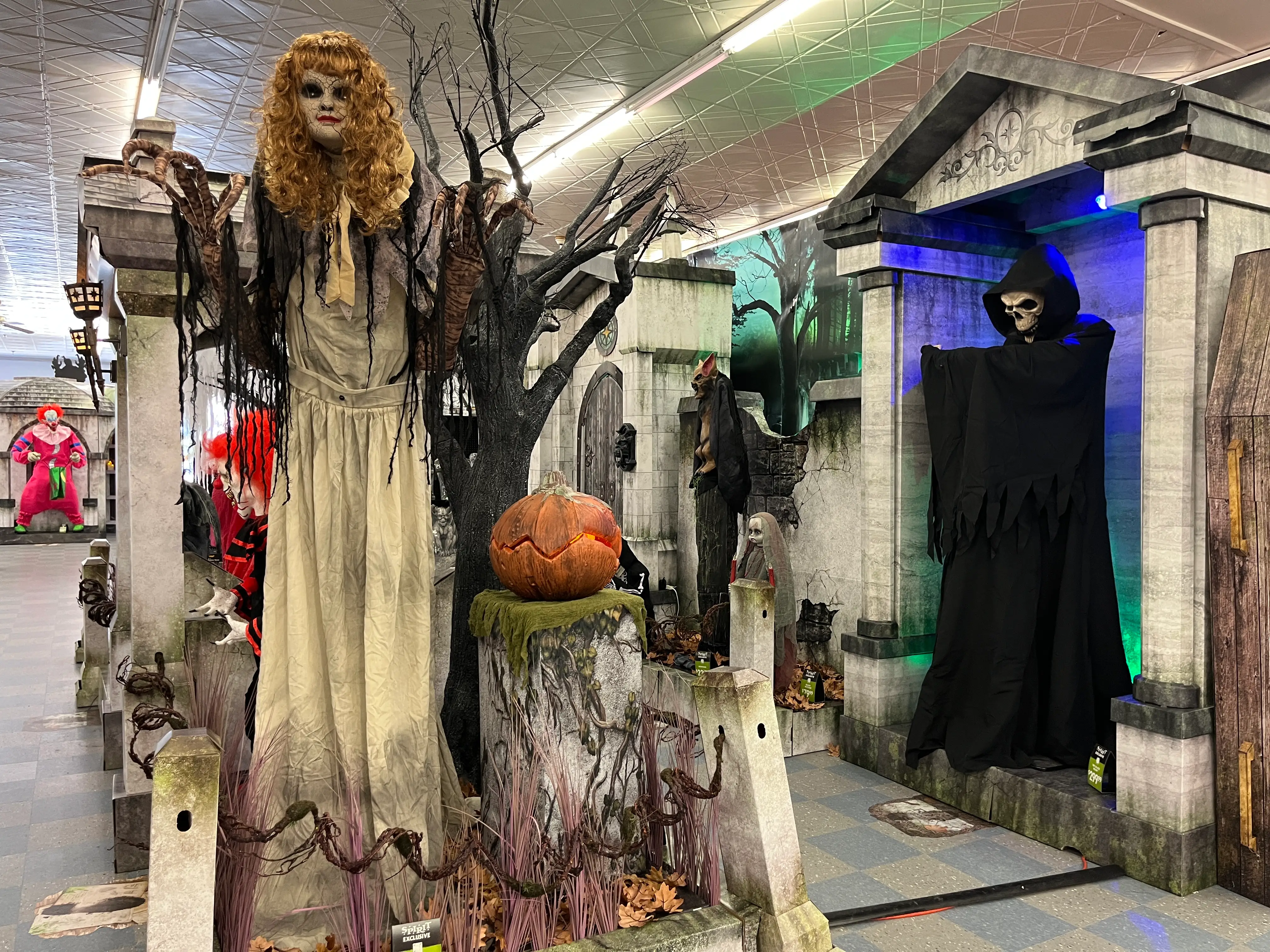Large animatronics on display at Spirit Halloween.
