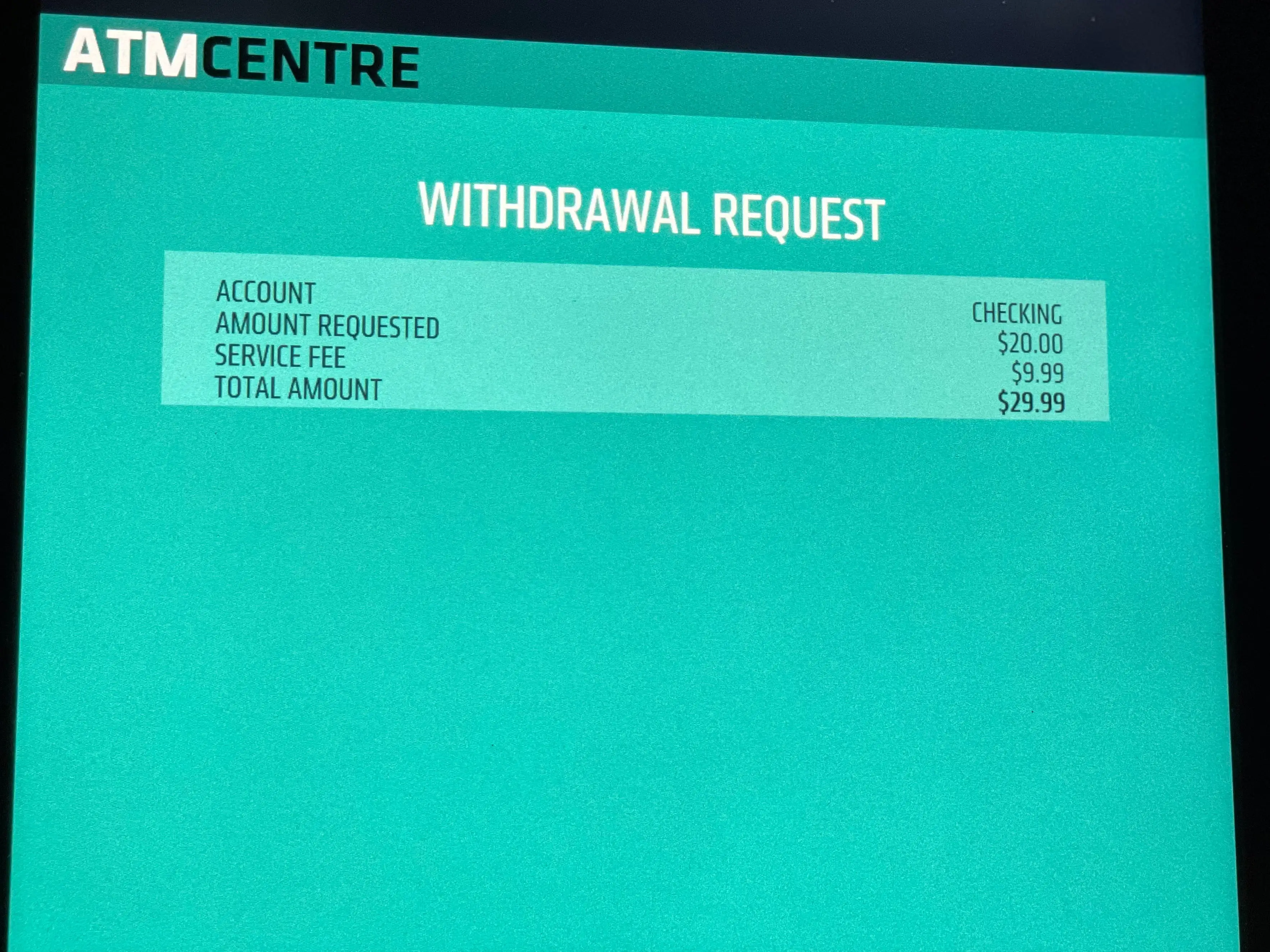 at, screen in vegas displaying a $20 withdrawal with a $10 service fee