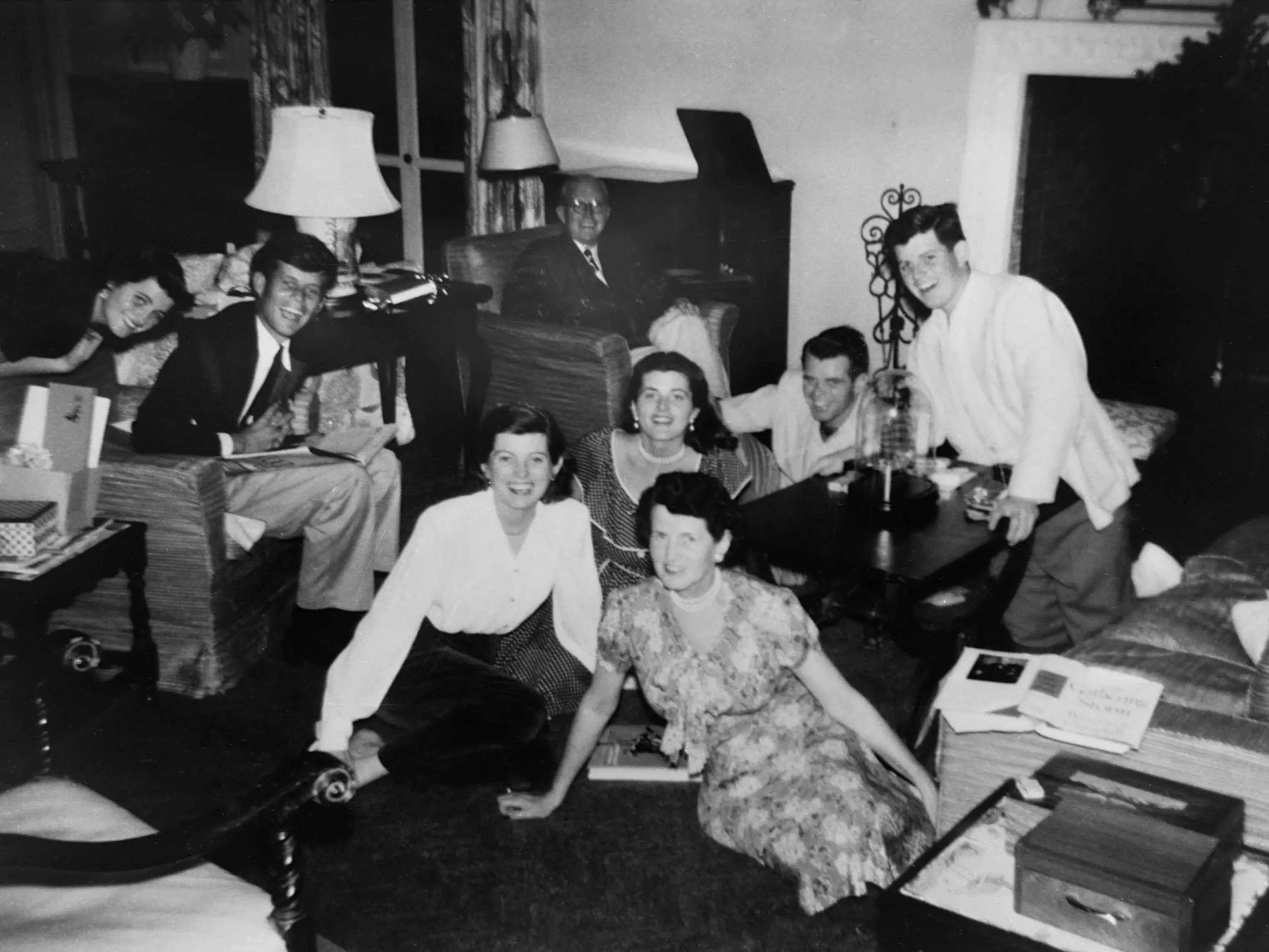 Joseph P. and Rose Kennedy surrounded by their children at a family gathering at their home in Palm Beach, Florida.