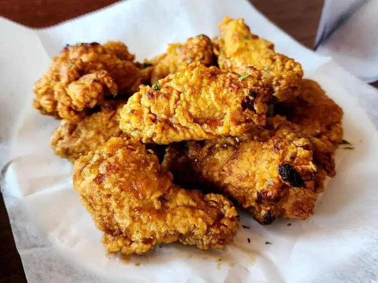 Chicken wings on a plate.