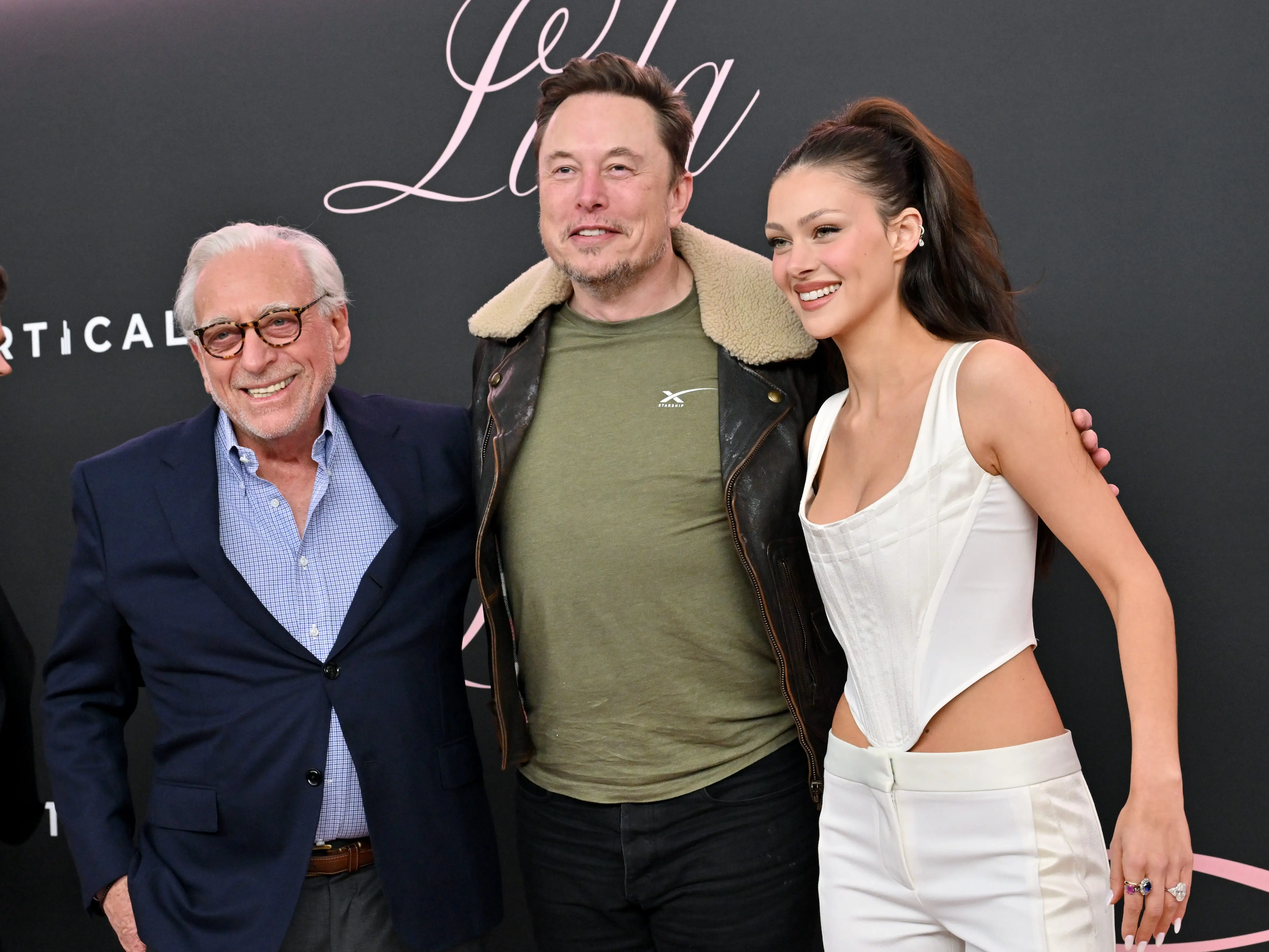 Nelson Peltz, Elon Musk and Nicola Peltz Beckham attend the Premiere of 