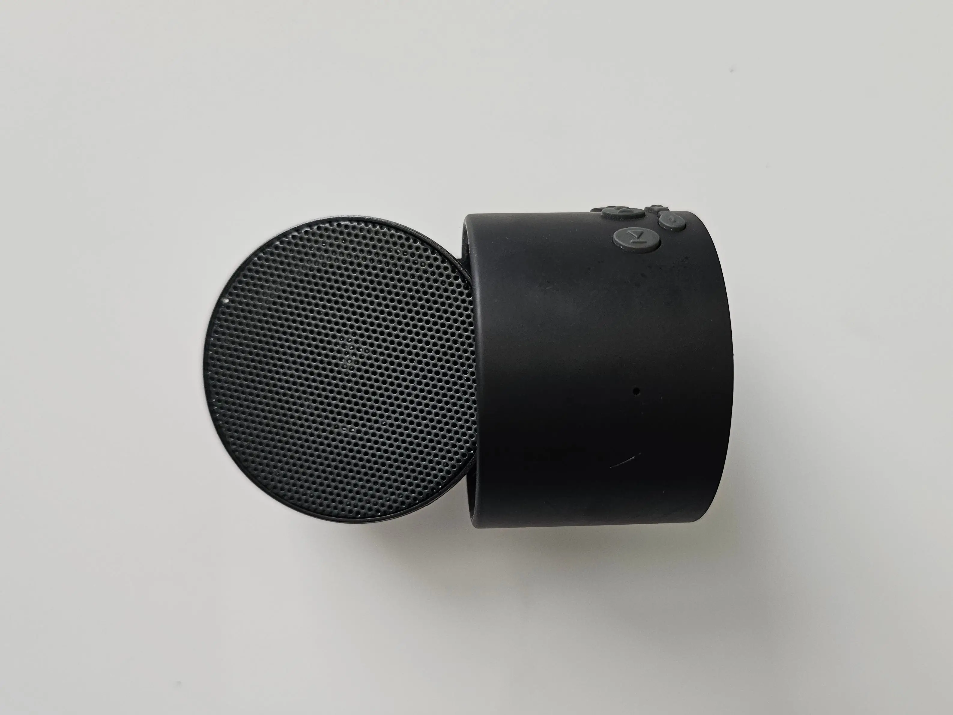 A black speaker from LectroFan on a white surface.