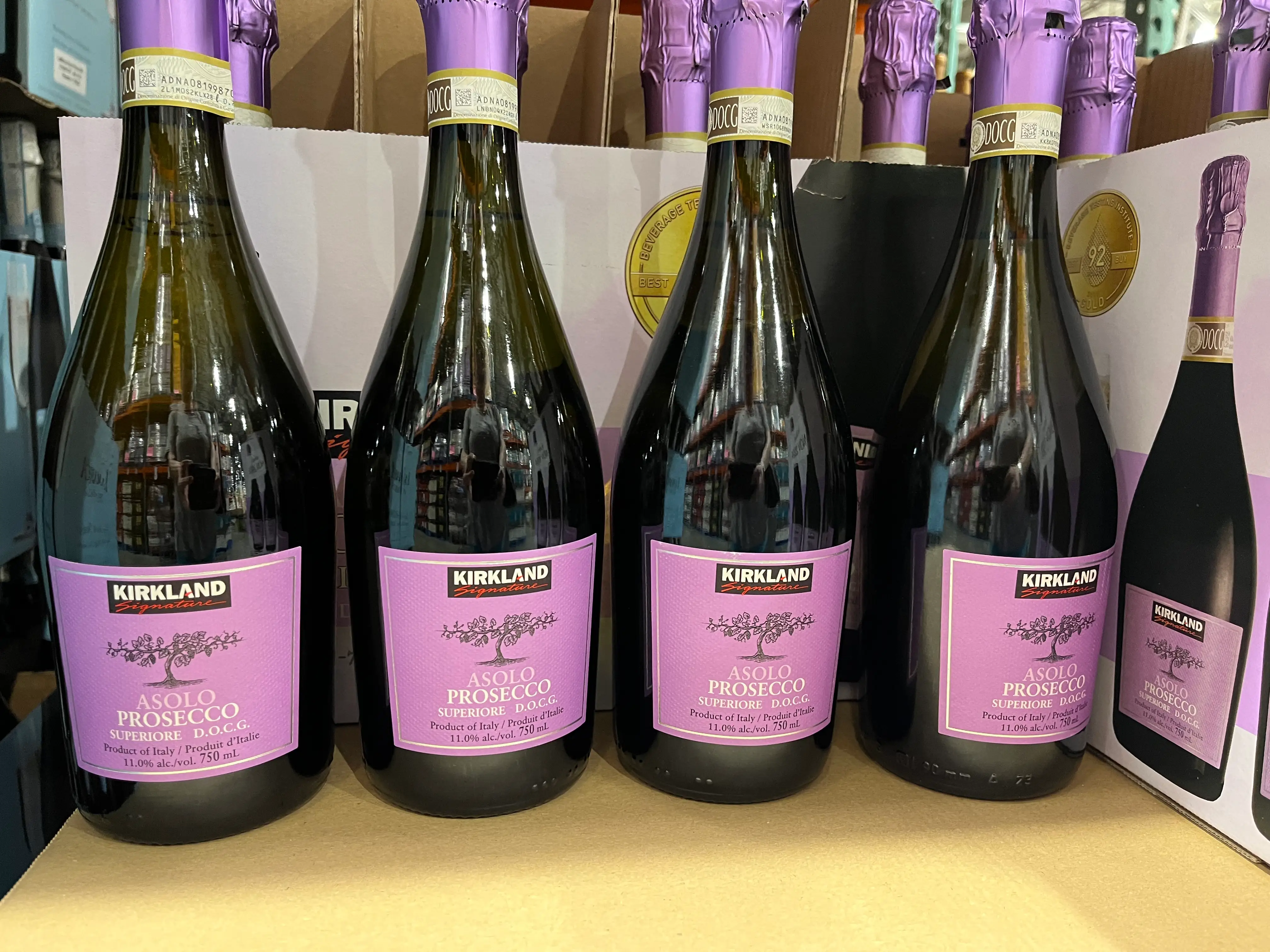 bottles of kirkland prosecco on the shelves at Costco