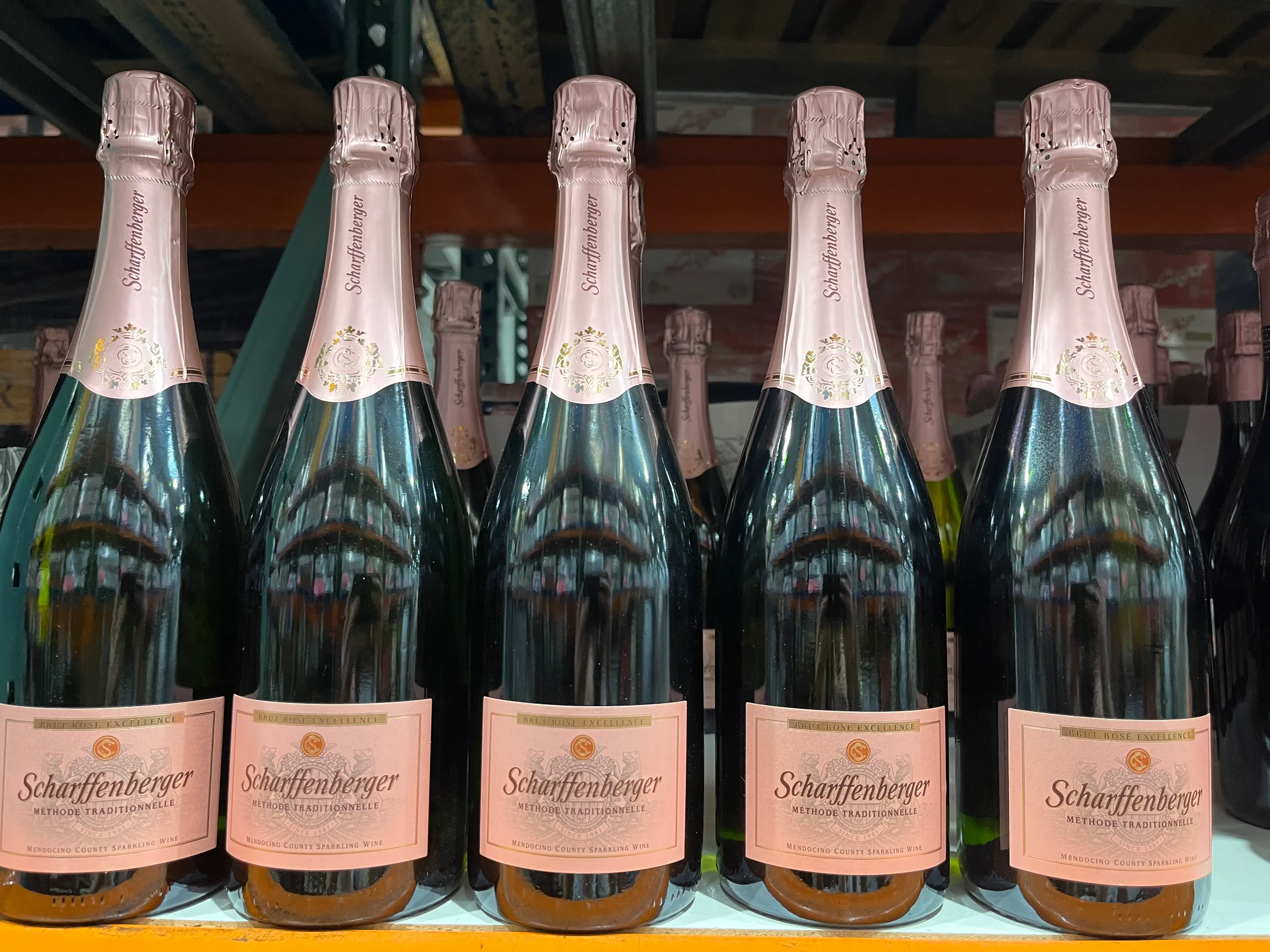 bottles of sparkling rose on the shelves at costco