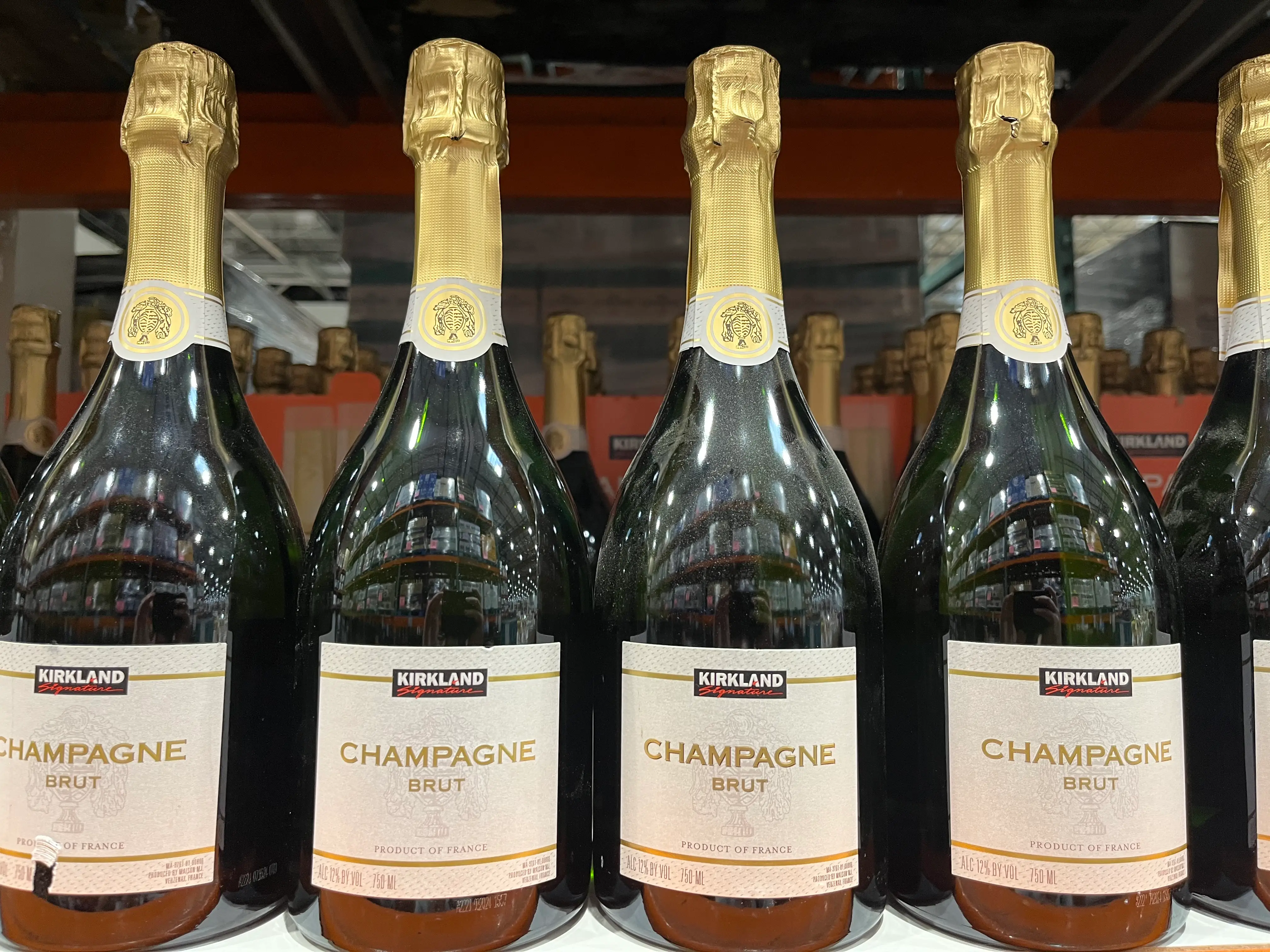 botles of kirkland champagne on the shleves at costco