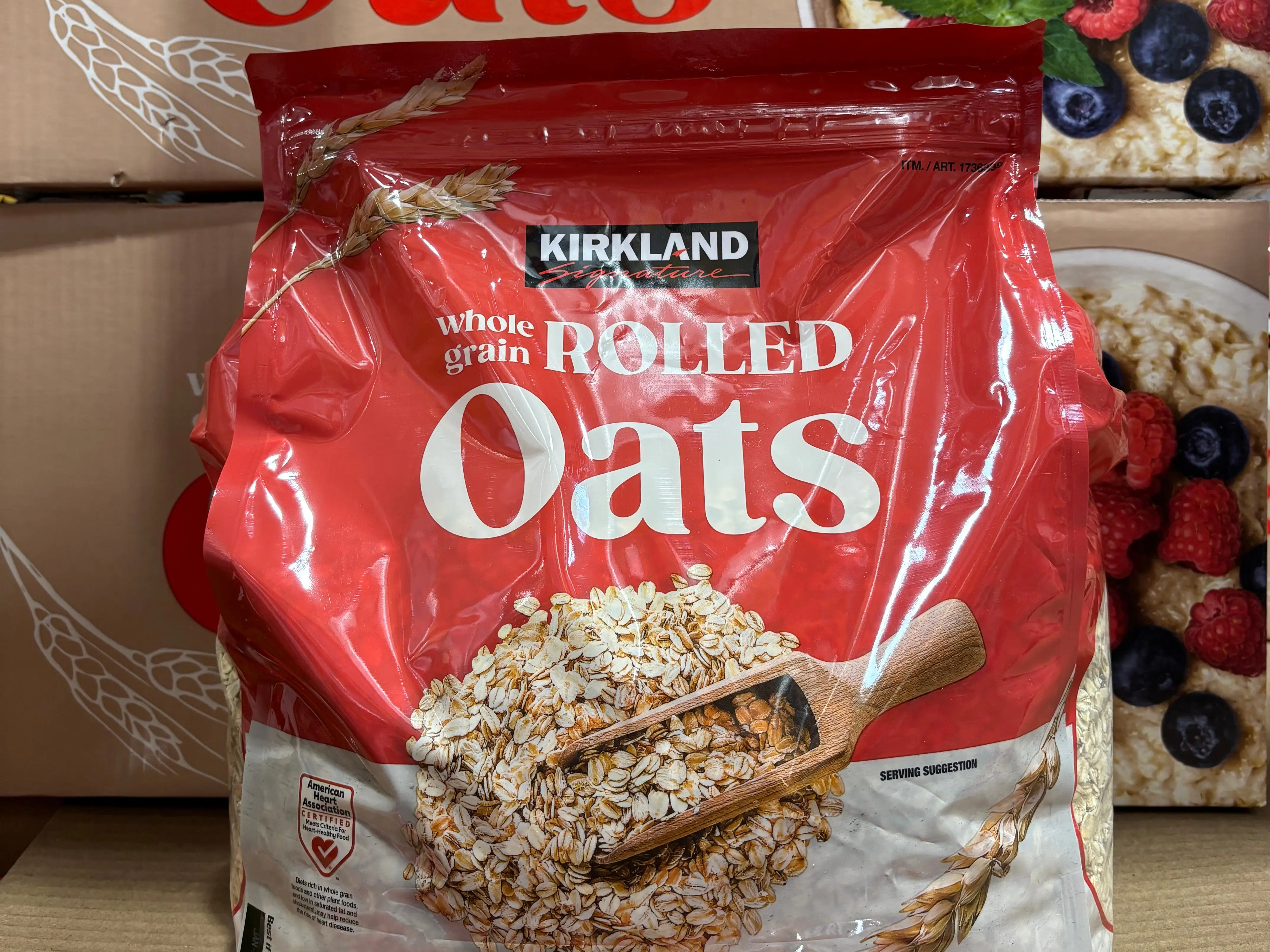 A bag of Kirkland Signature whole-grain rolled oats.
