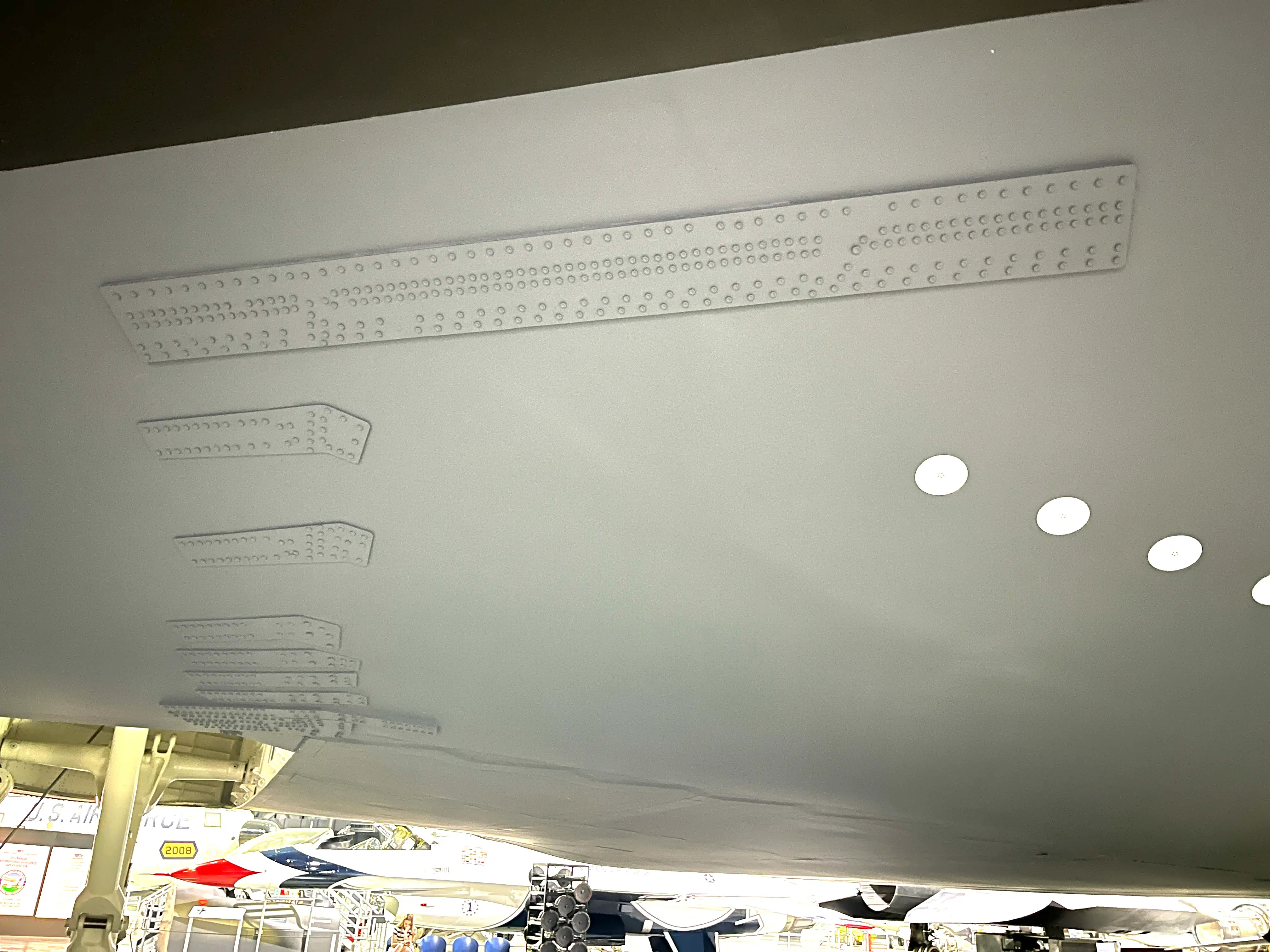 Patches under the wing of a B-2 at the National Museum of the US Air Force.