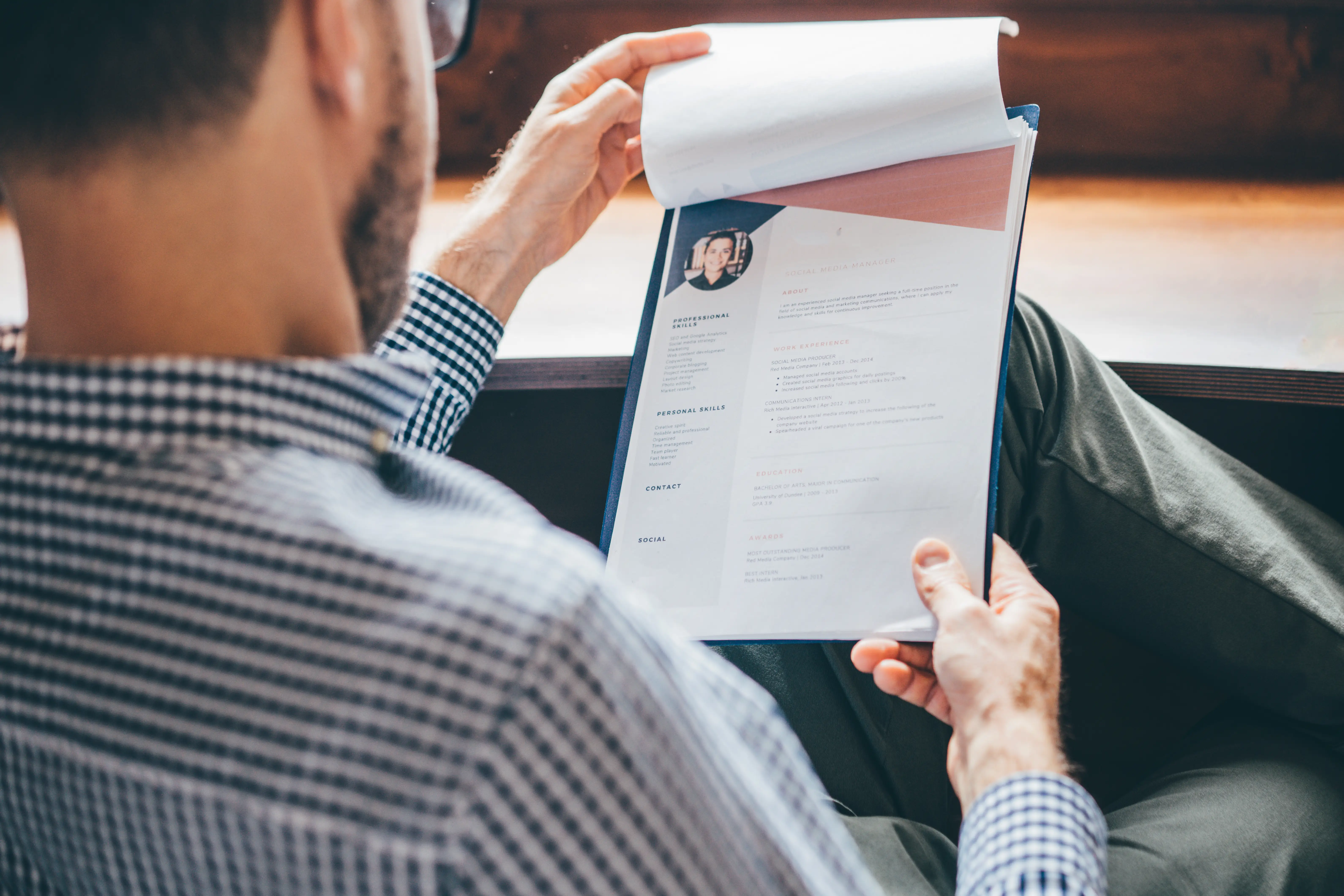 Man reads a resume
