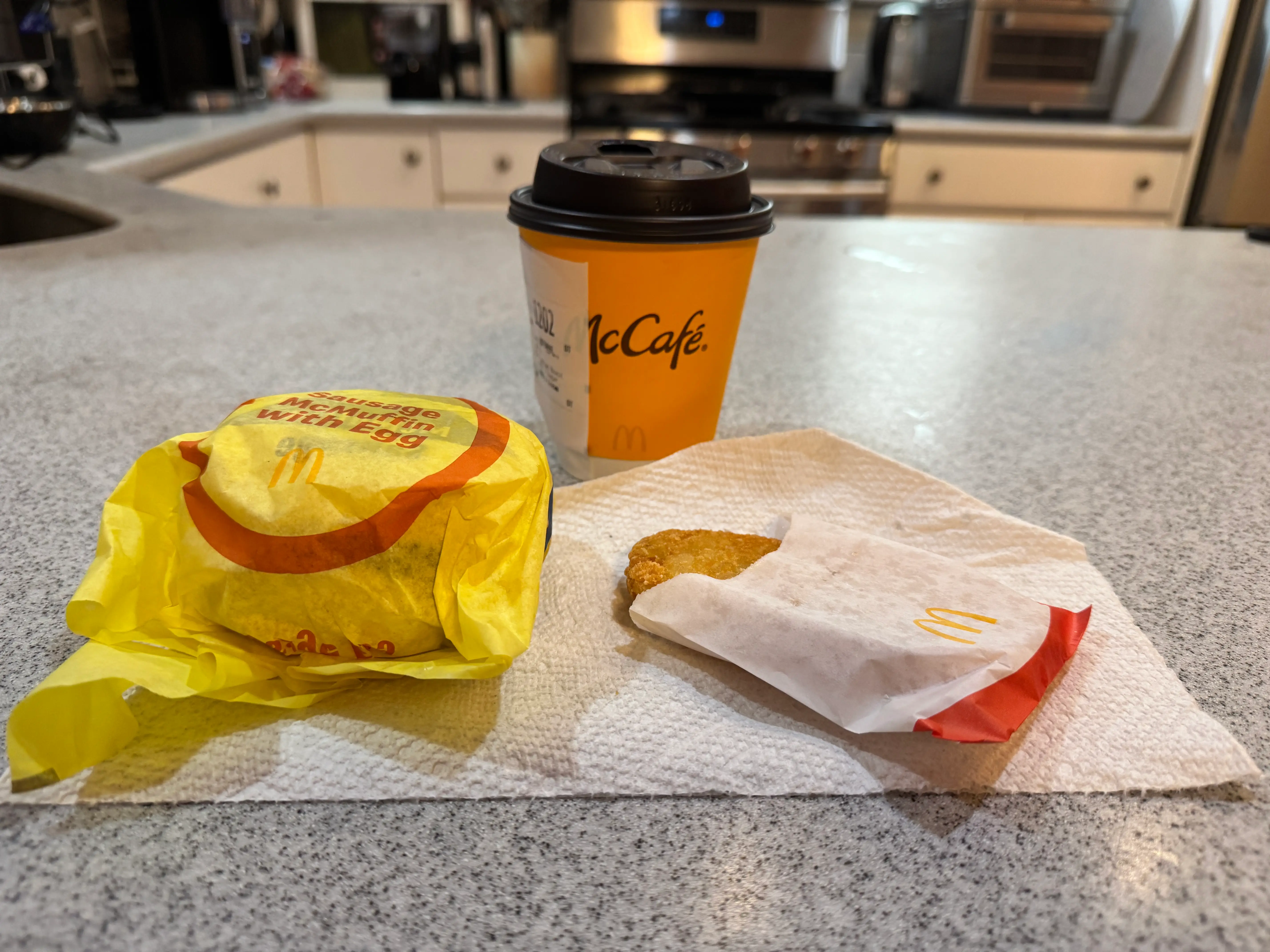 mcdonalds extra value meal sausage mcmuffin hash brown coffee