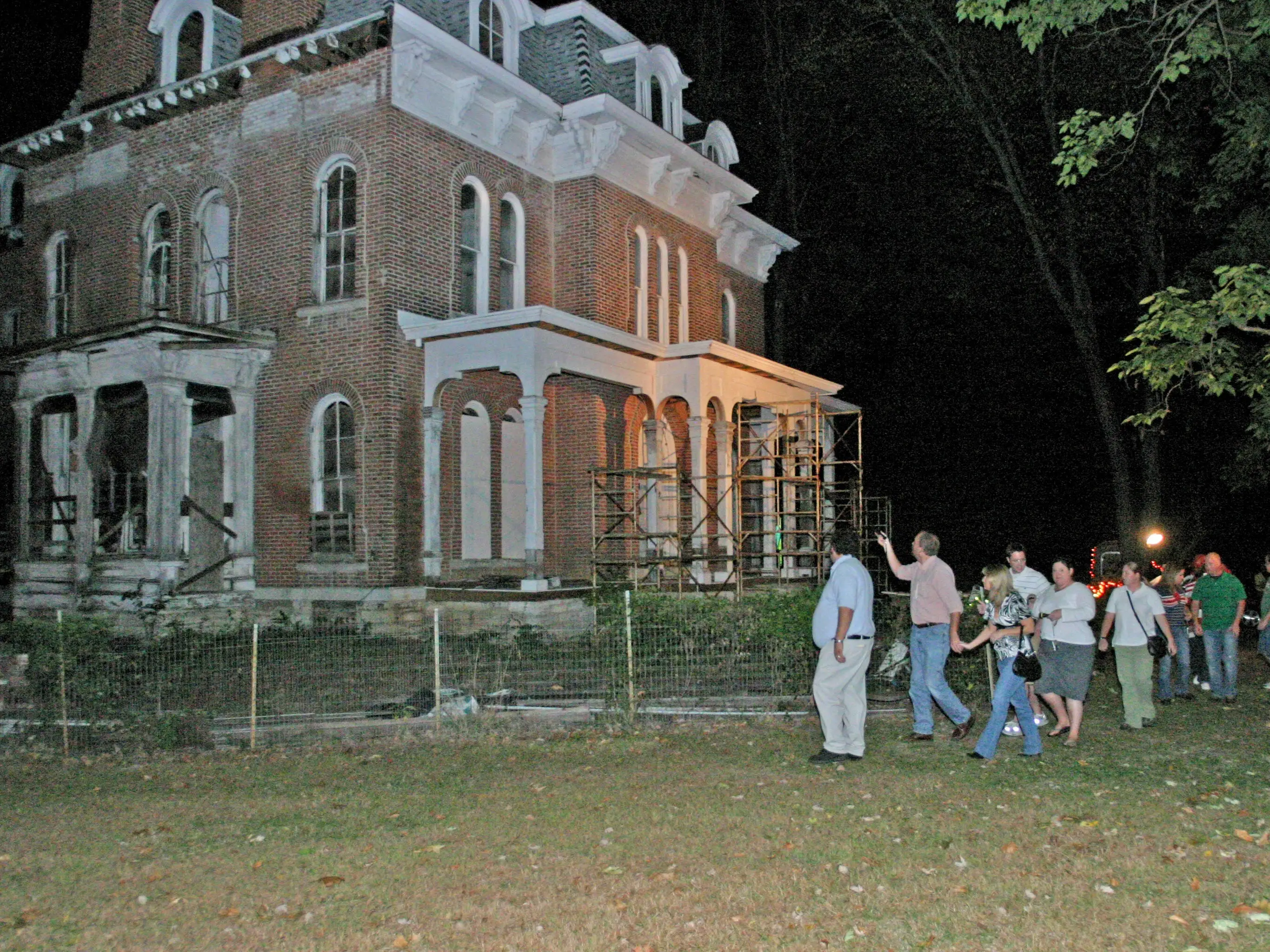 A guided tour takes place at the notorious McPike Mansion in Alton, Illinois.