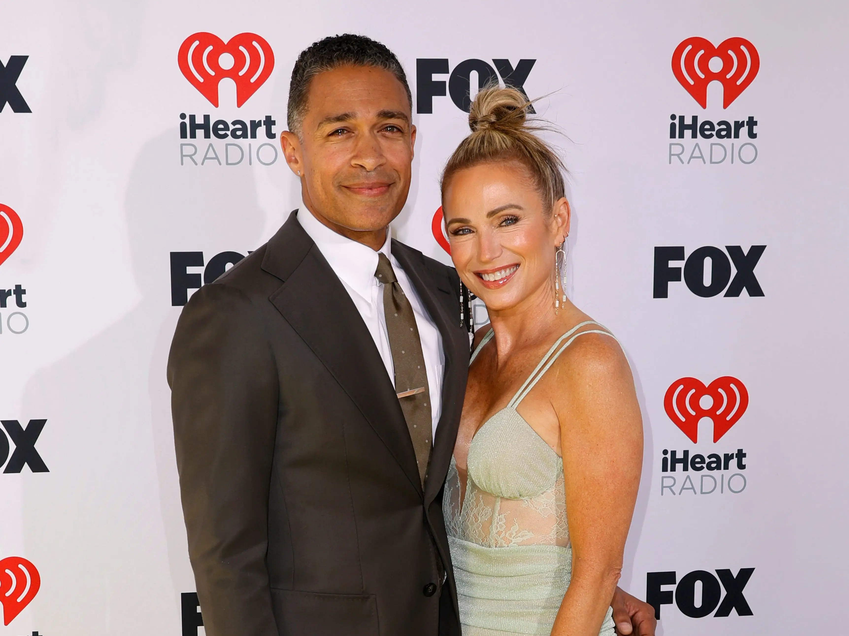 TJ Holmes and Amy Robach attend the 2024 iHeartRadio Music Awards at Dolby Theatre on April 01, 2024