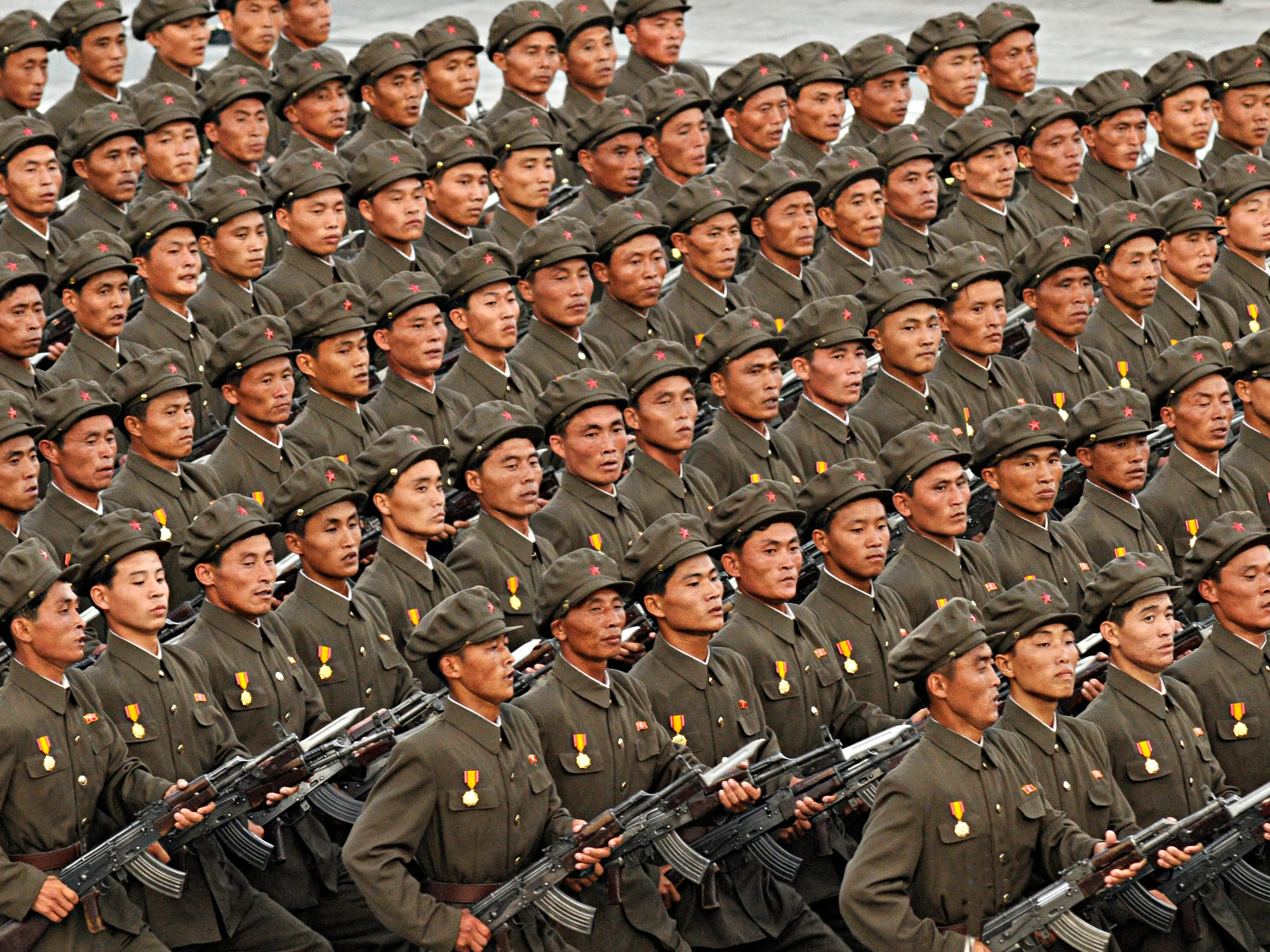Military parade in Kim Il Sung Square in Pyongyang, capital of the Democratic People's Republic of Korea (DPRK). The Democratic People's Republic of Korea (DPRK) staged a military parade marking the 60th anniversary of the founding of the nation.