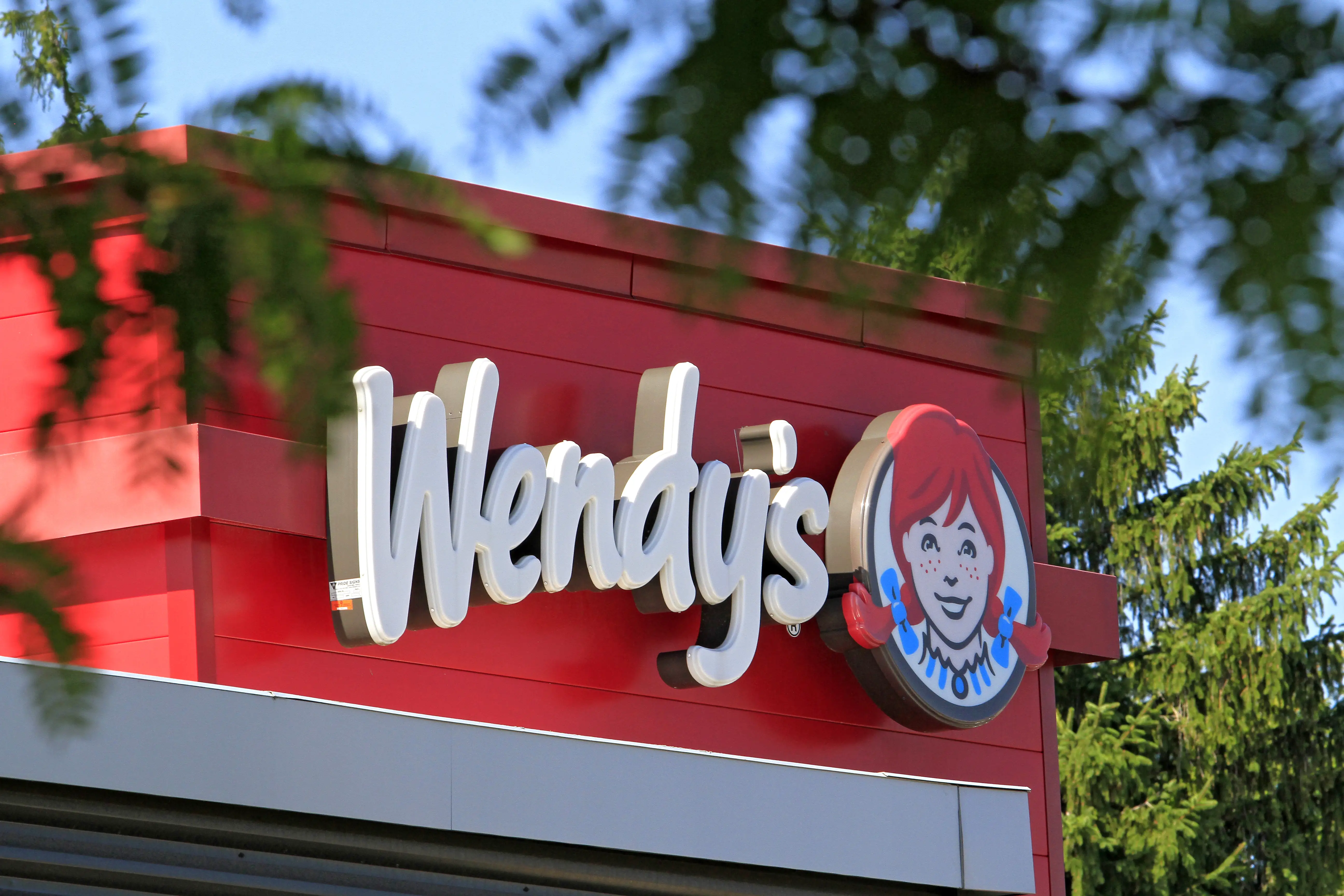 The signage for Wendy's restaurant is shown in Brampton, Ontario, on August 22, 2025. (Photo by Mike Campbell/NurPhoto via Getty Images)