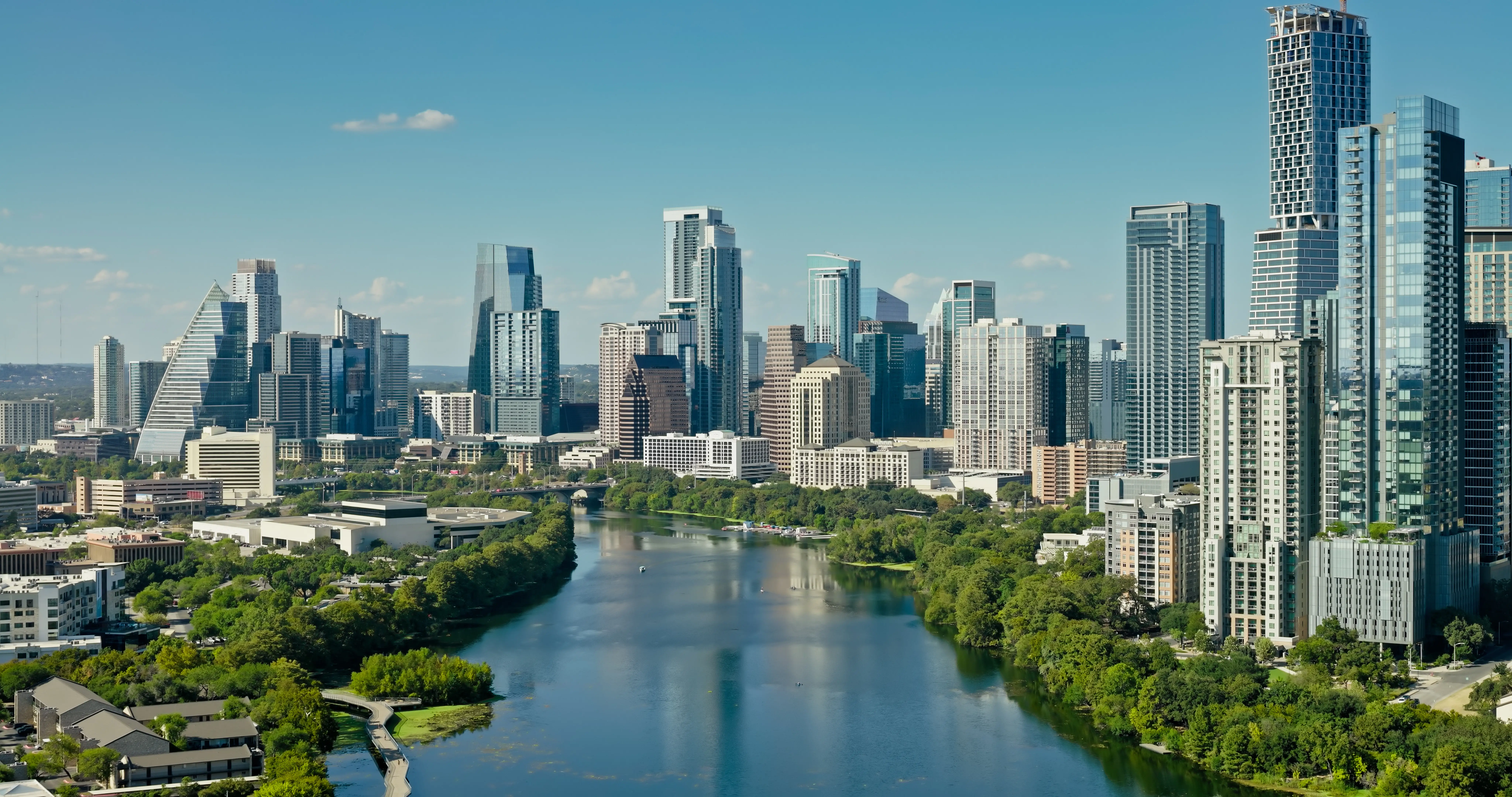 Aerial shot of Downtown Austin and Lady Bird Lake.