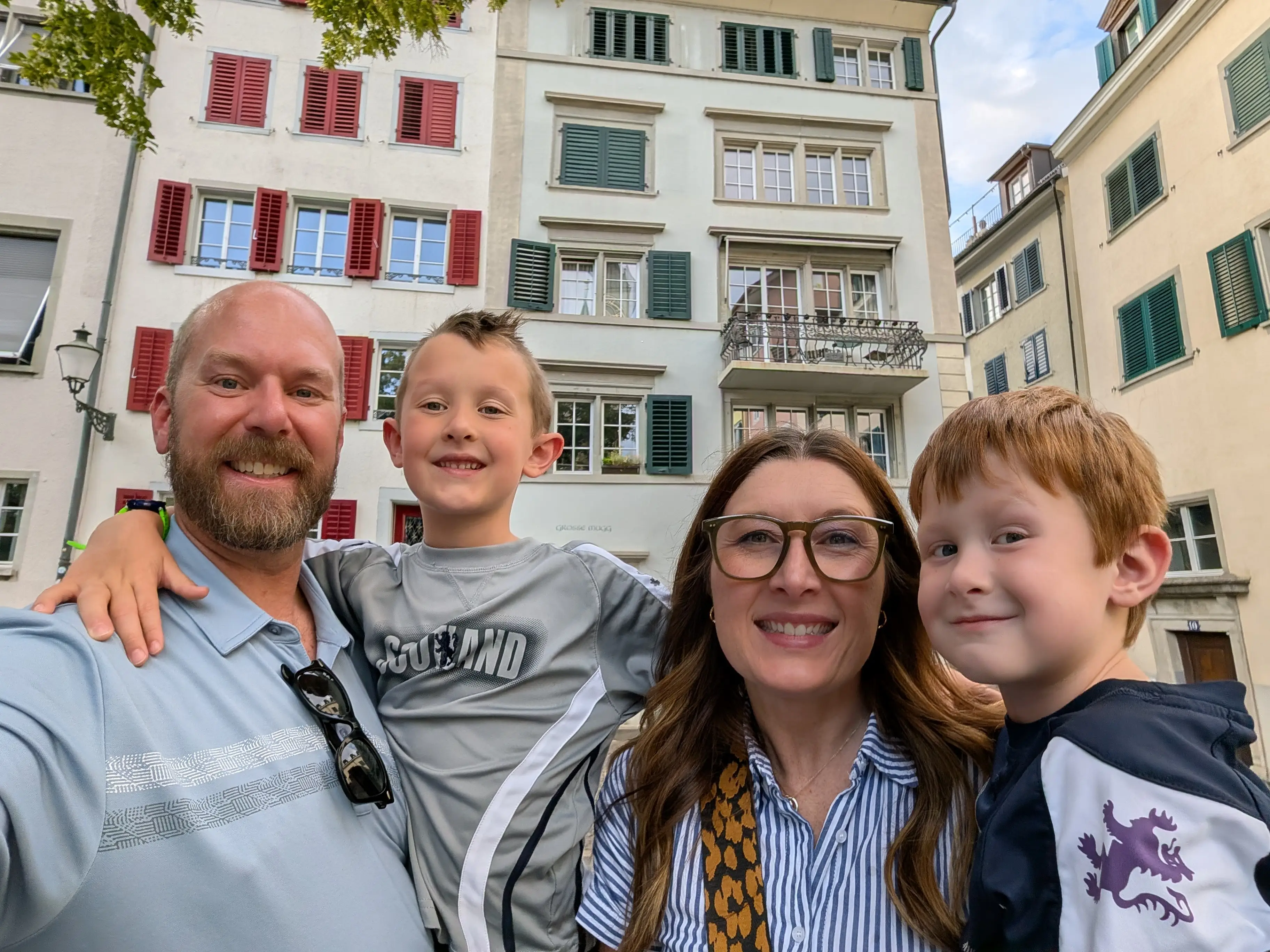 Family smiling in Zurich