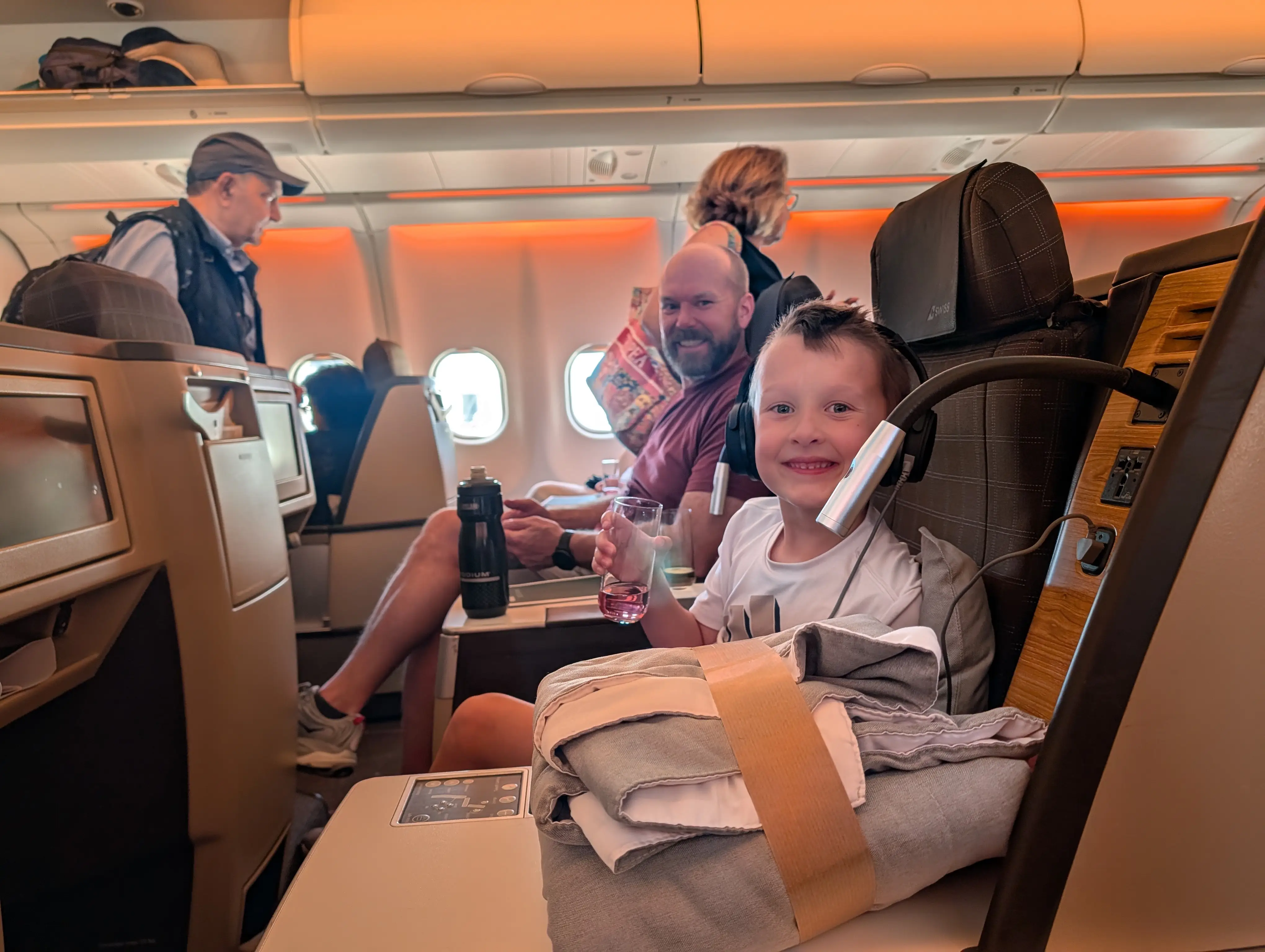Family sitting in Swiss Air Business Class