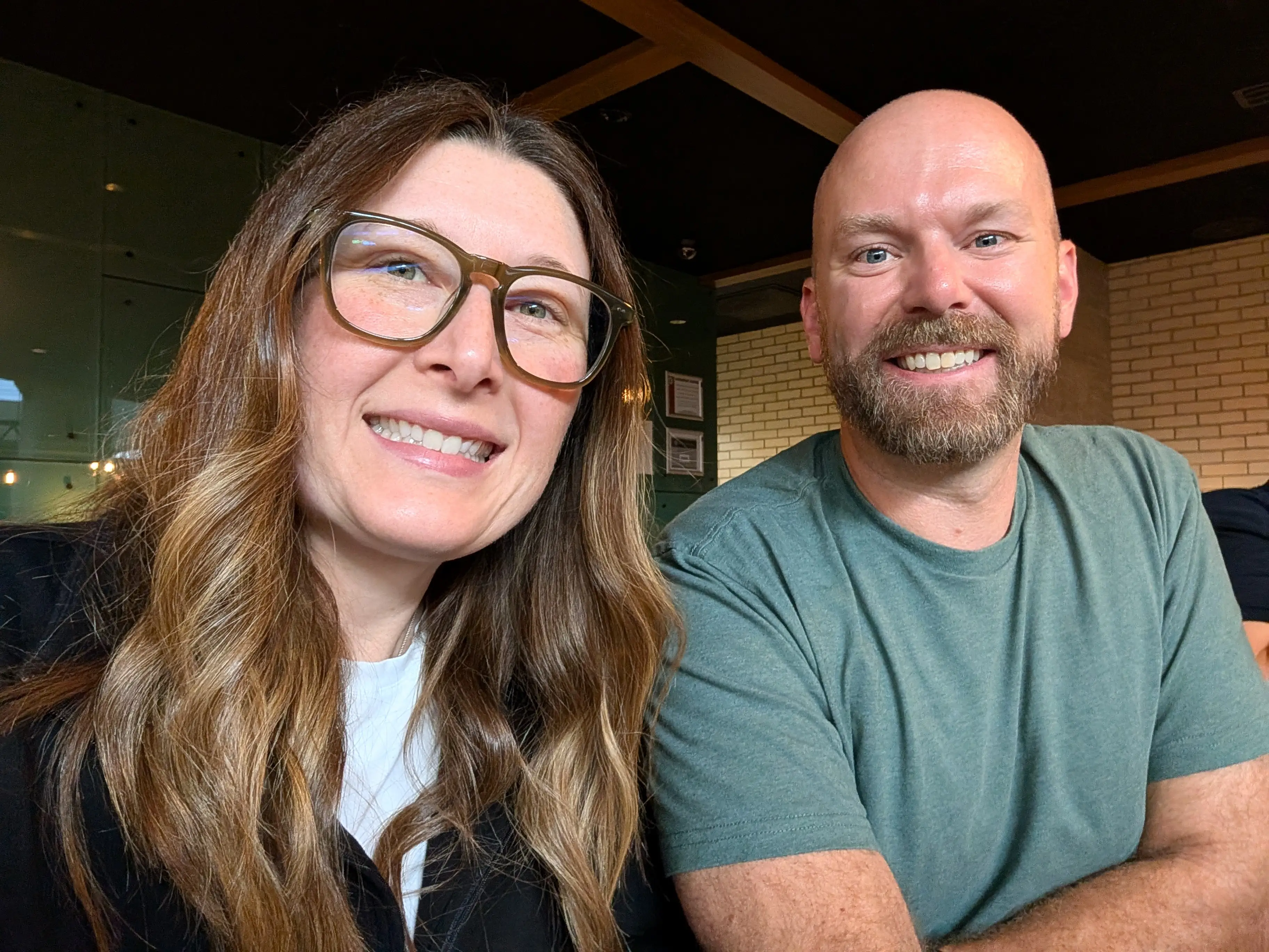 Two people smiling in Chicago airport