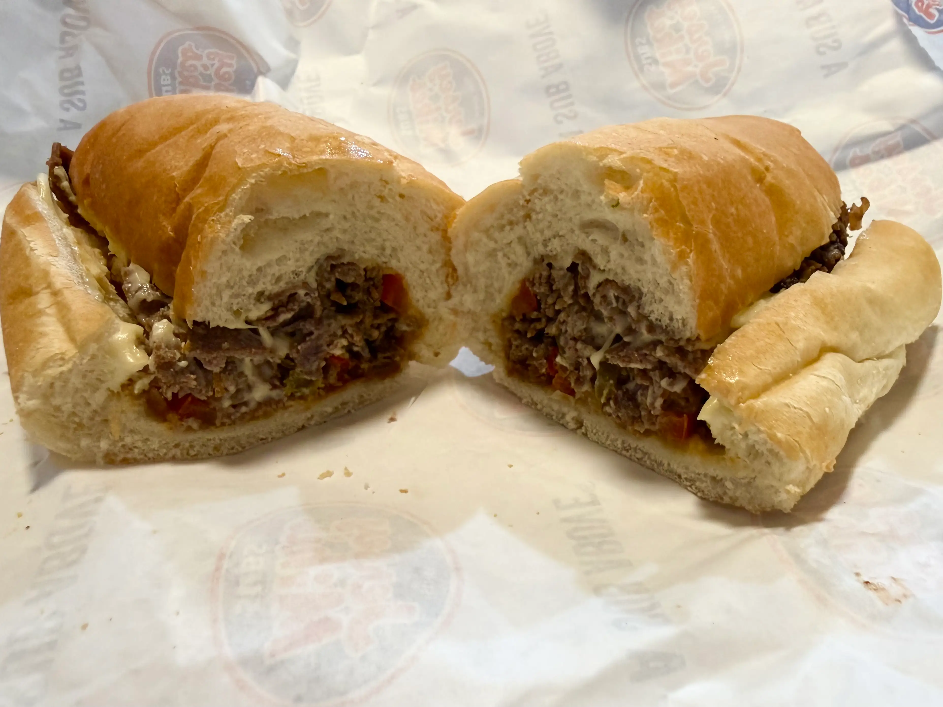 Jersey Mike's philly cheesesteak broken in half