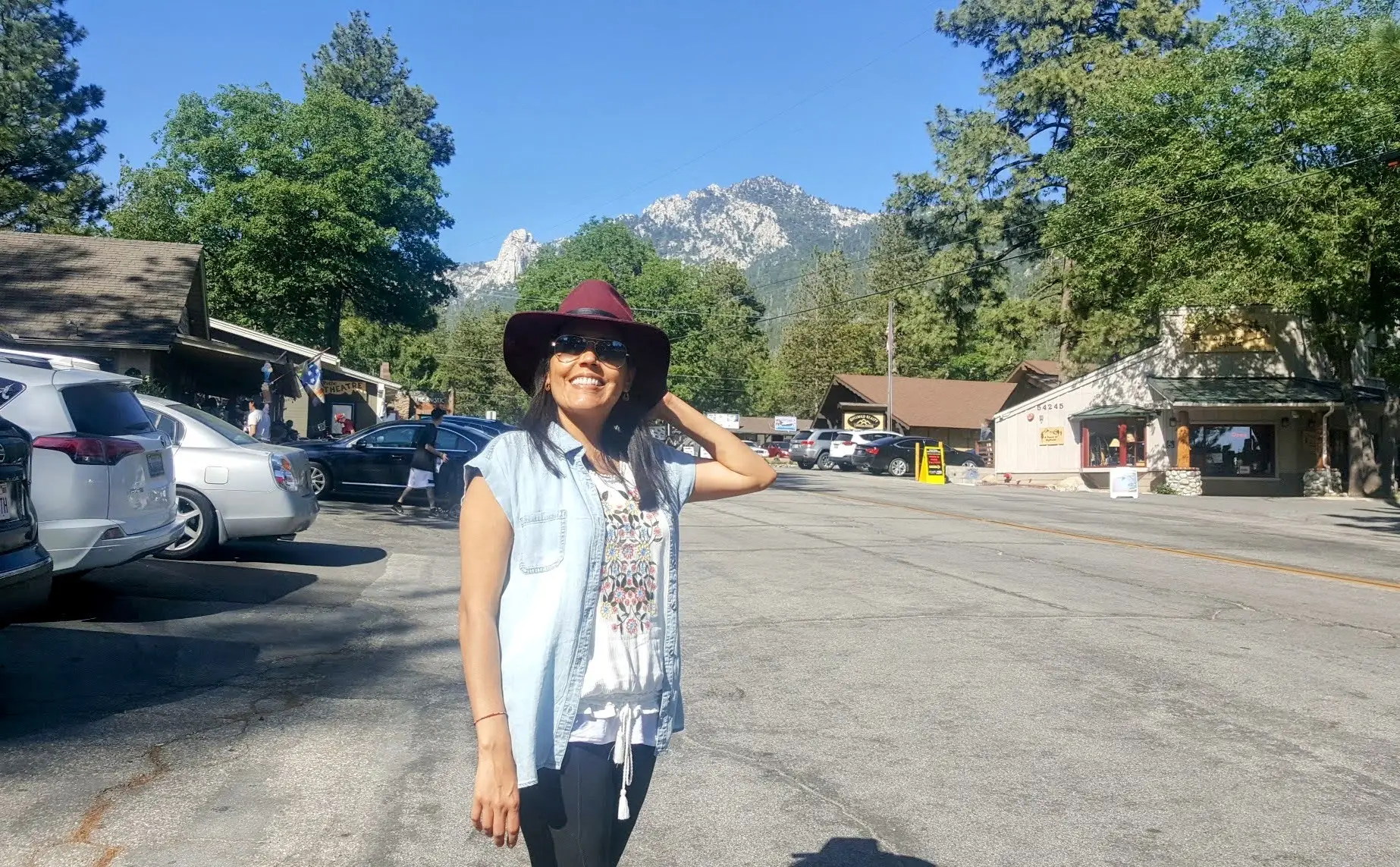 Woman in hat smiling in Idyllwild
