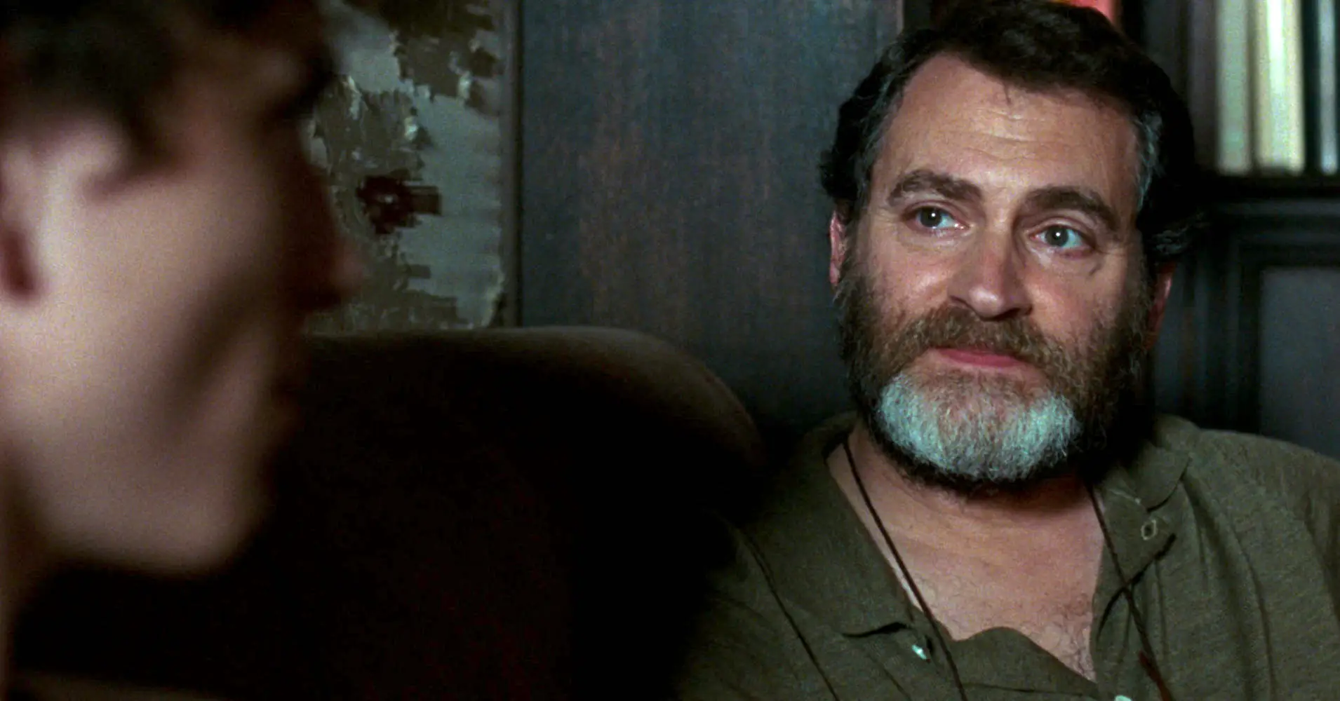 Michael Stuhlbarg sitting in a couch