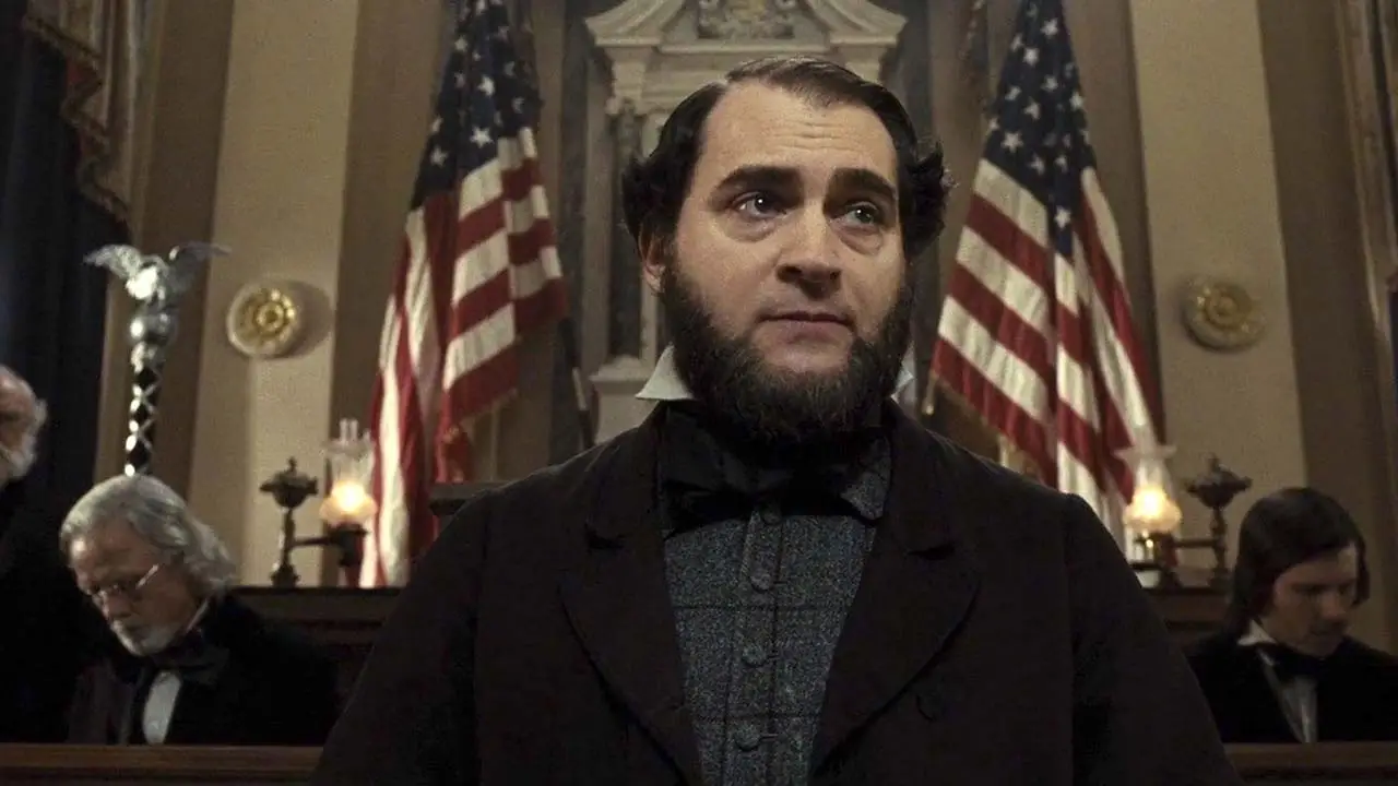Michael Stuhlbarg in a beard and tweed jacket