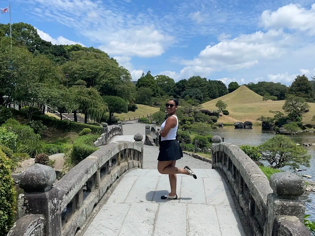 Woman smiling on bridge in Japan