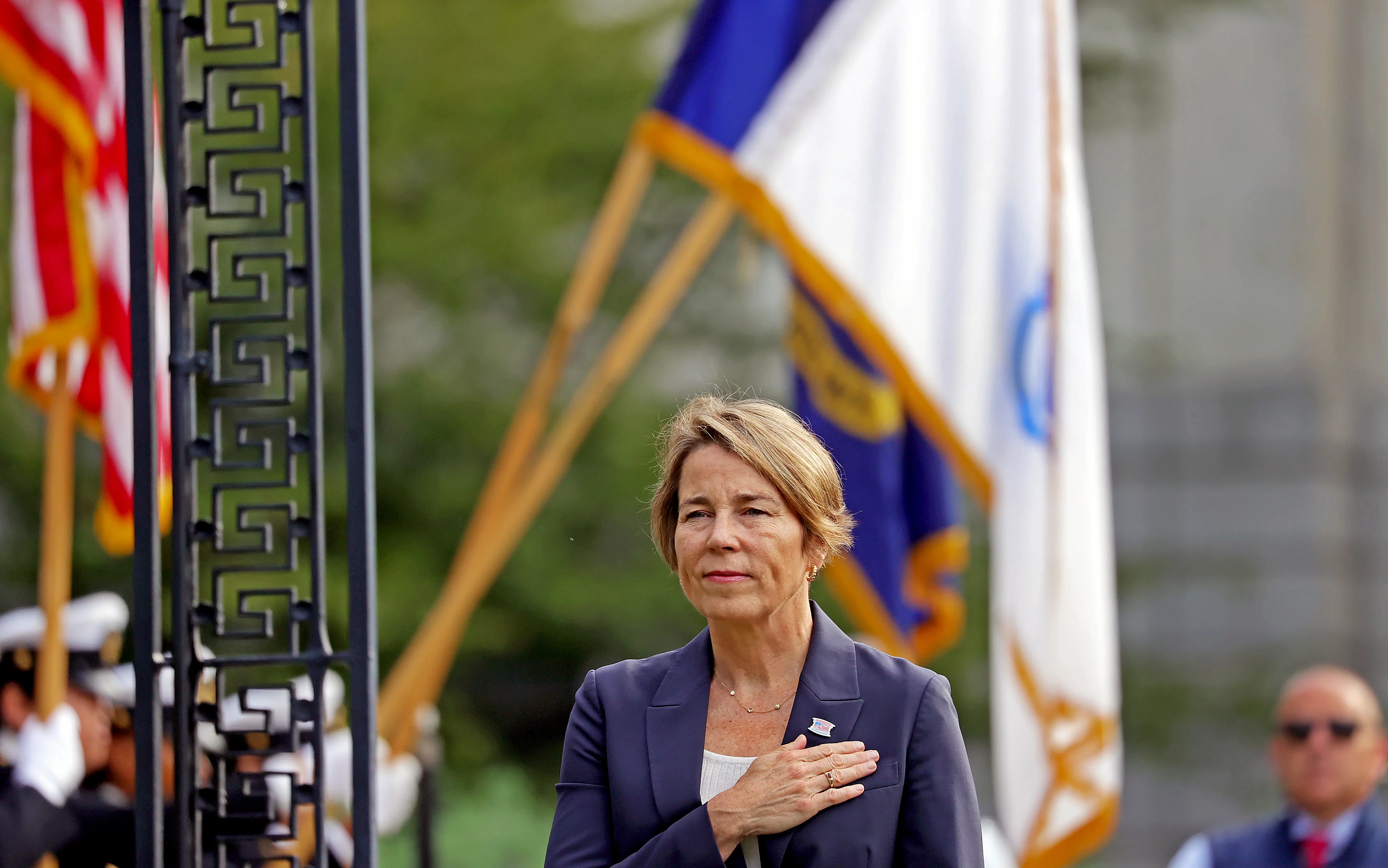 A woman in a suit.