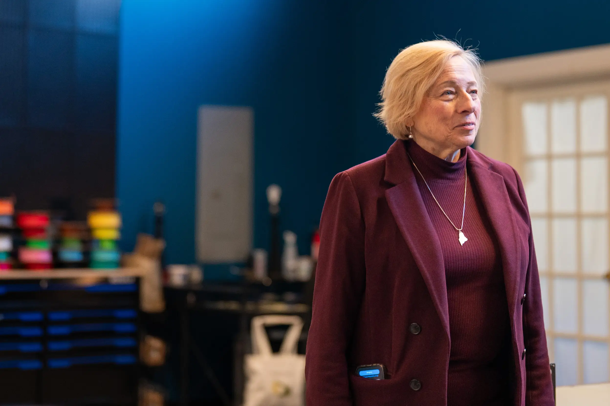 A woman in a suit.