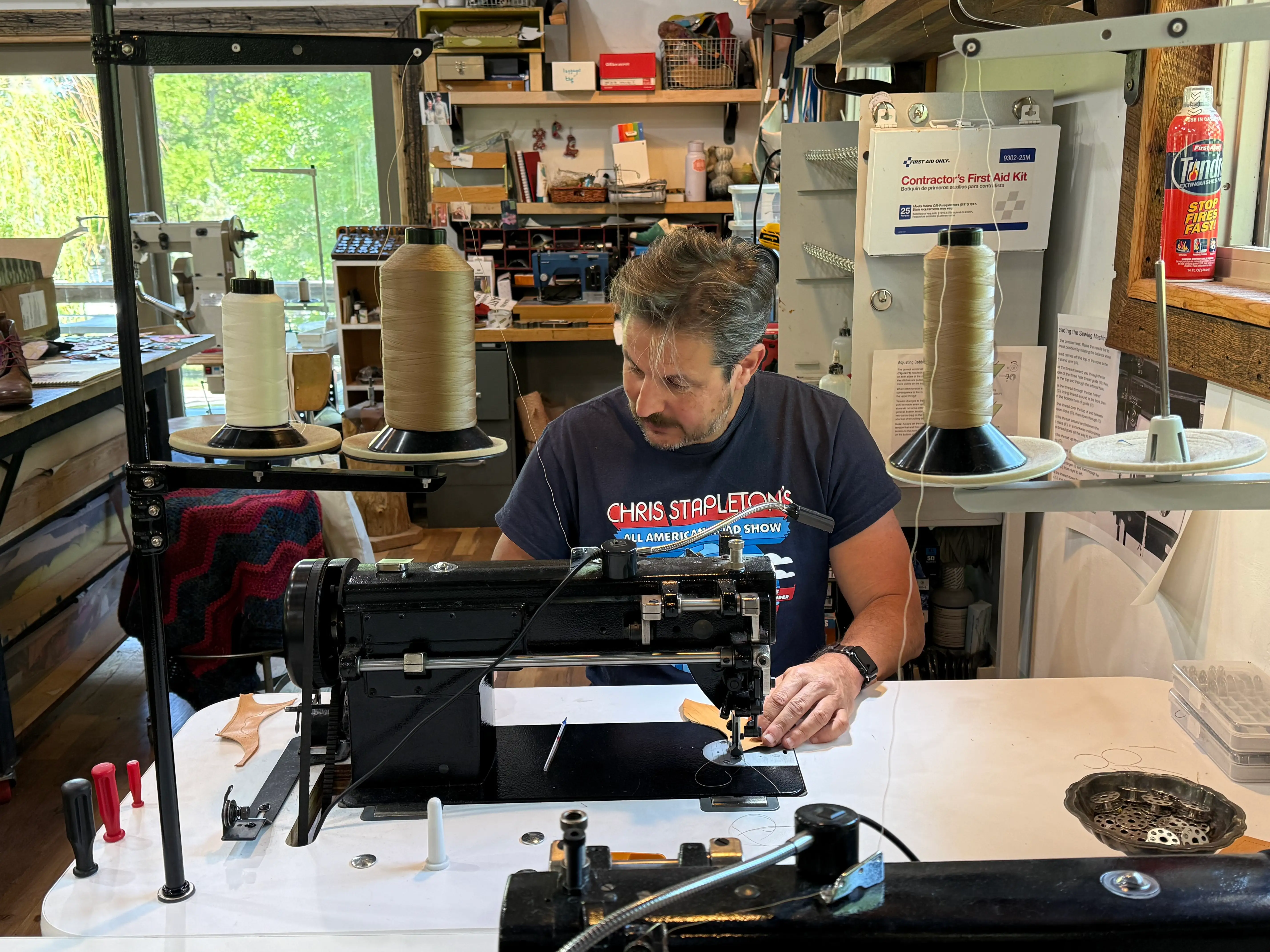 Man at sewing machine