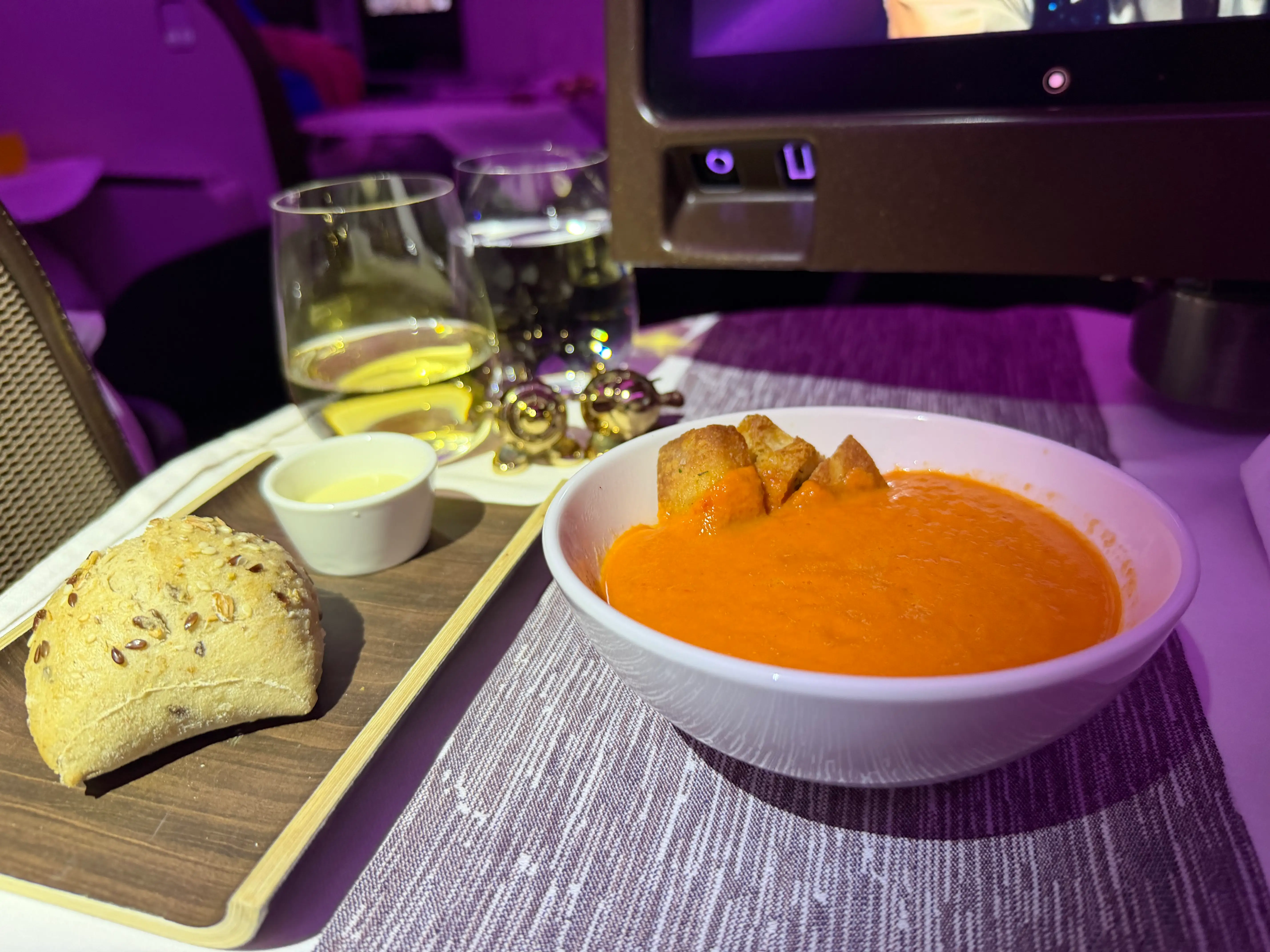 Soup, meal service on table tray with view of salt and pepper shakers shaped like planes