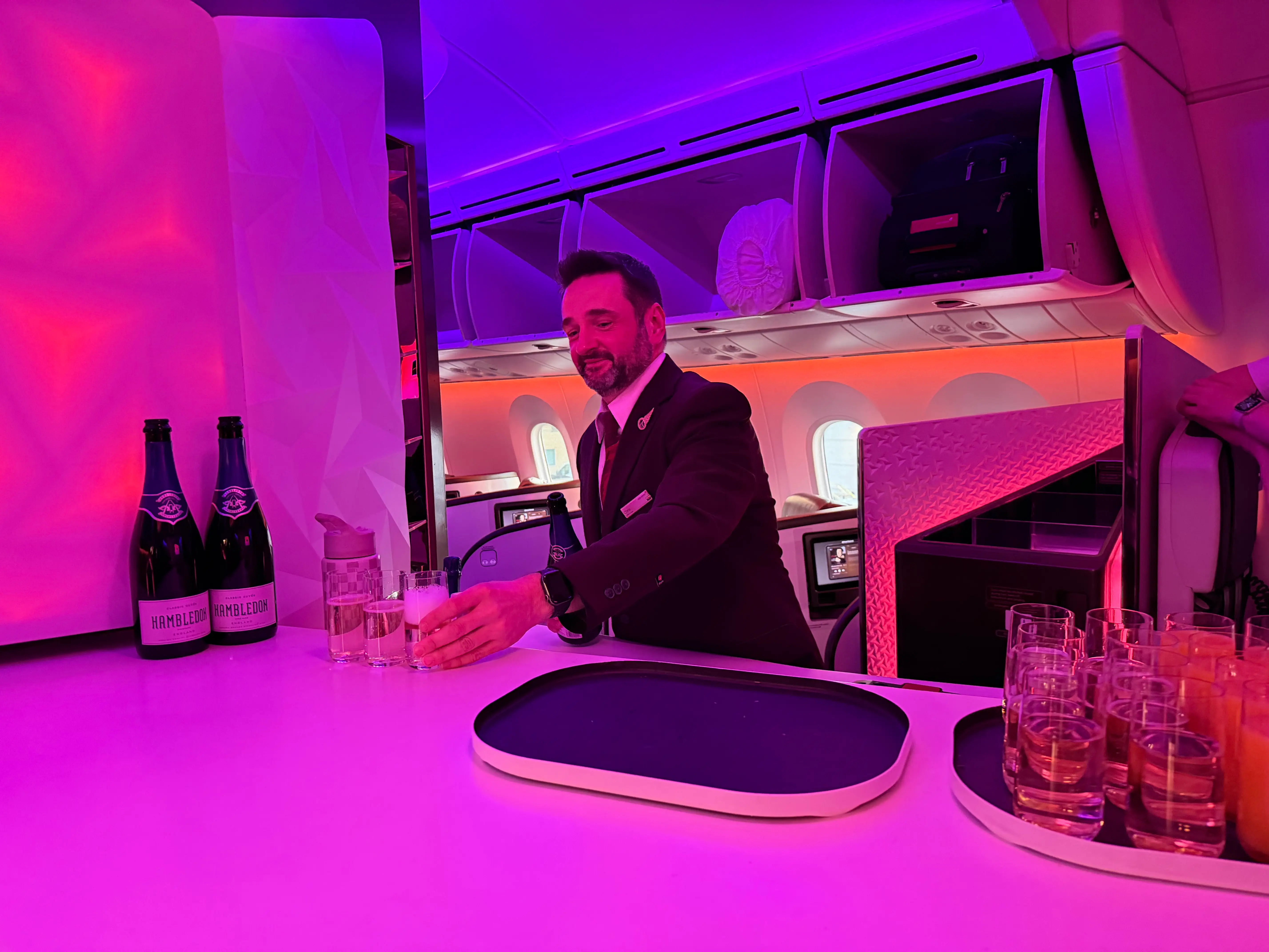 Man behind bar on Virgin Atlantic flight