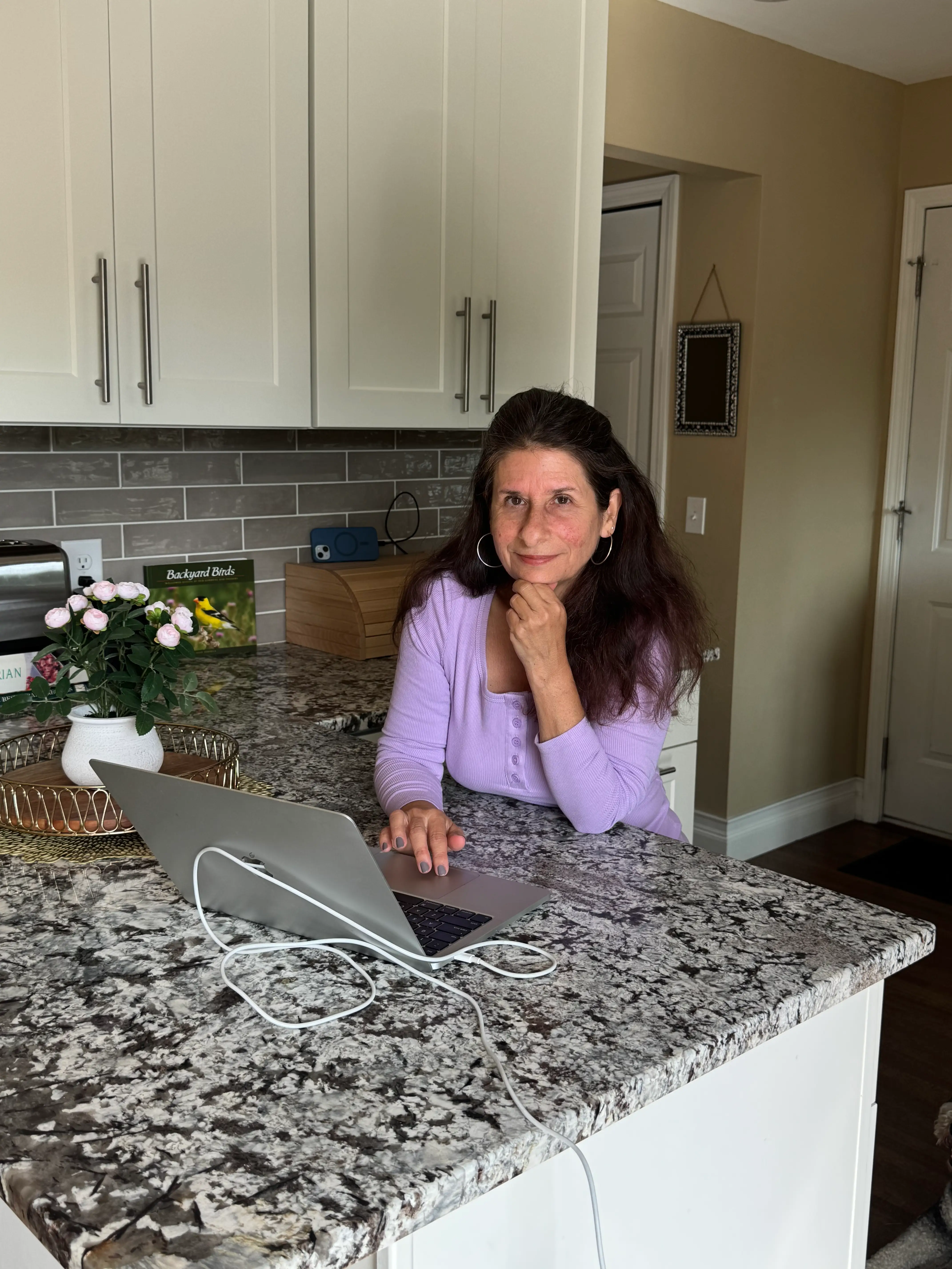 Woman at kitchen counter