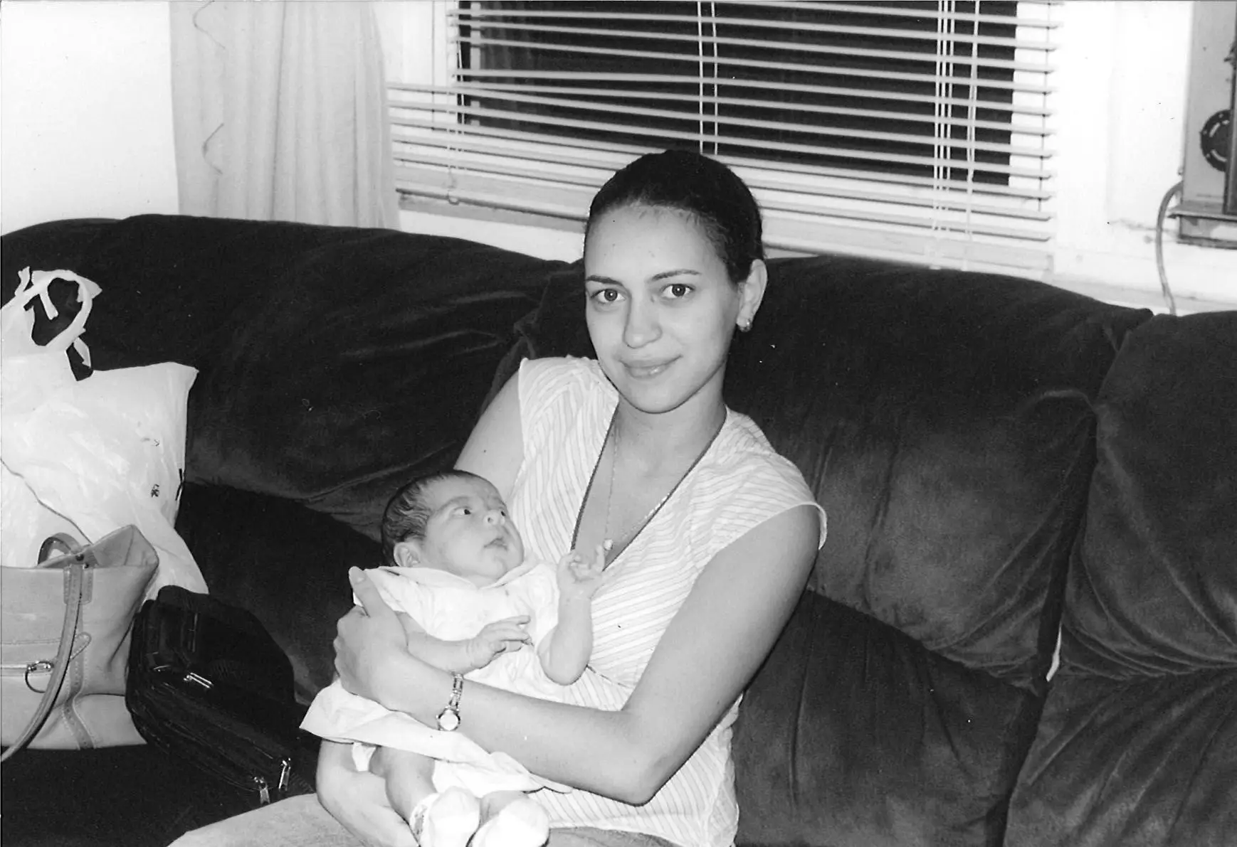 Old photo of mom holding baby