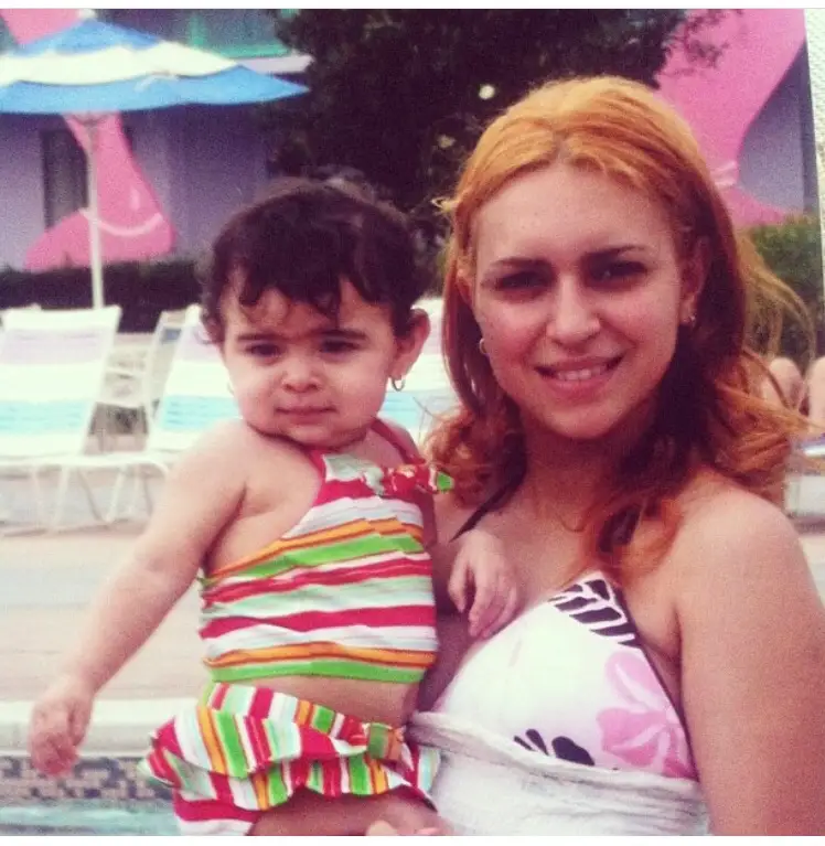Old photo of mom holding baby