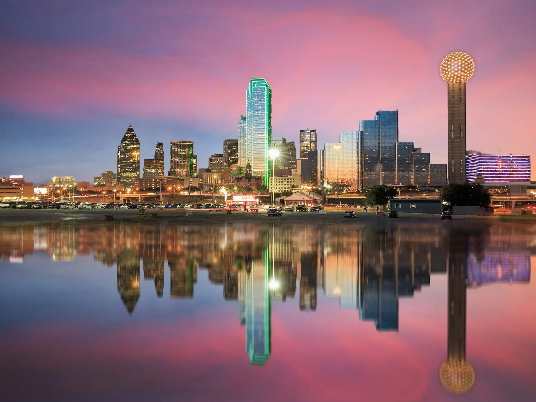 Dallas skyline reflected in Trinity river at sunset, Texas