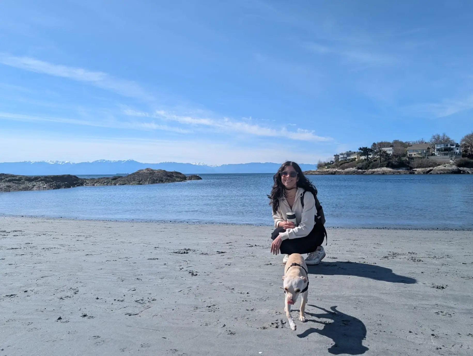 the author and her dog on the beach