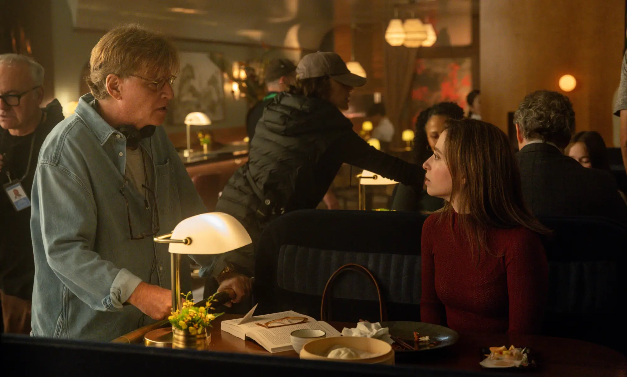 Aaron Sorkin and Mikey Madison on the set of 
