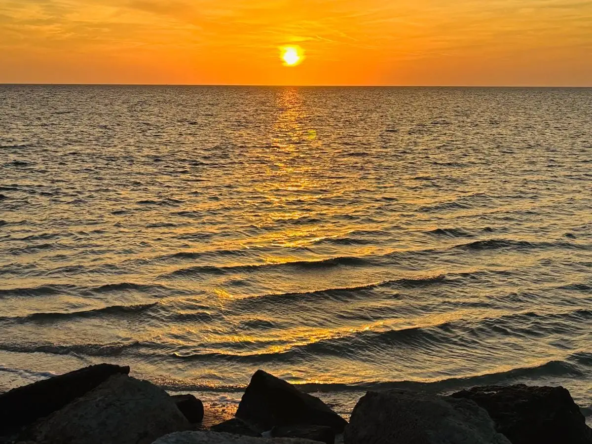 The sunset over the water in Tarpon Springs, Florida.