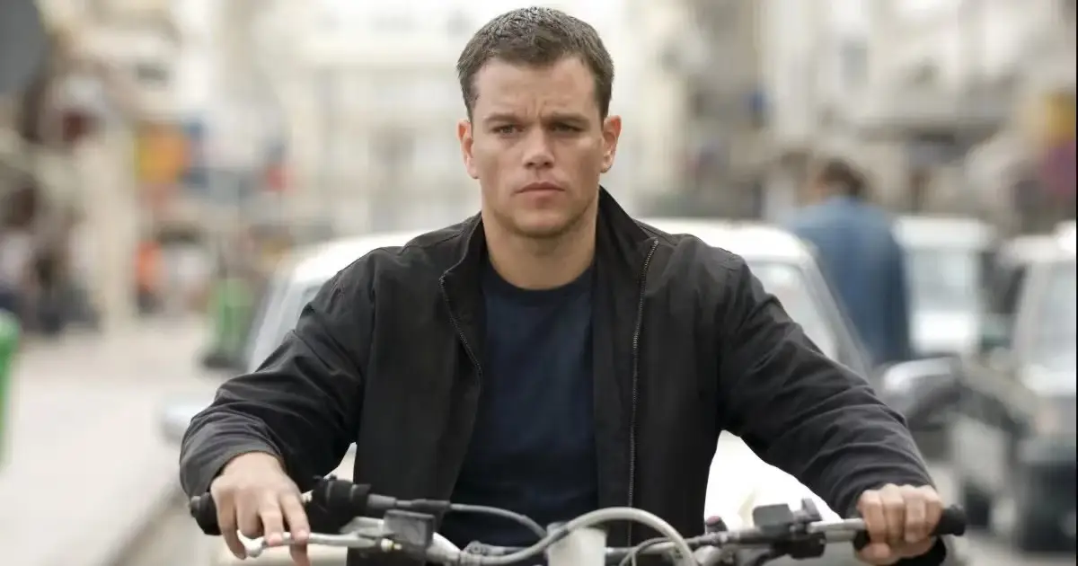 Matt Damon on a motorcycle as Jason Bourne