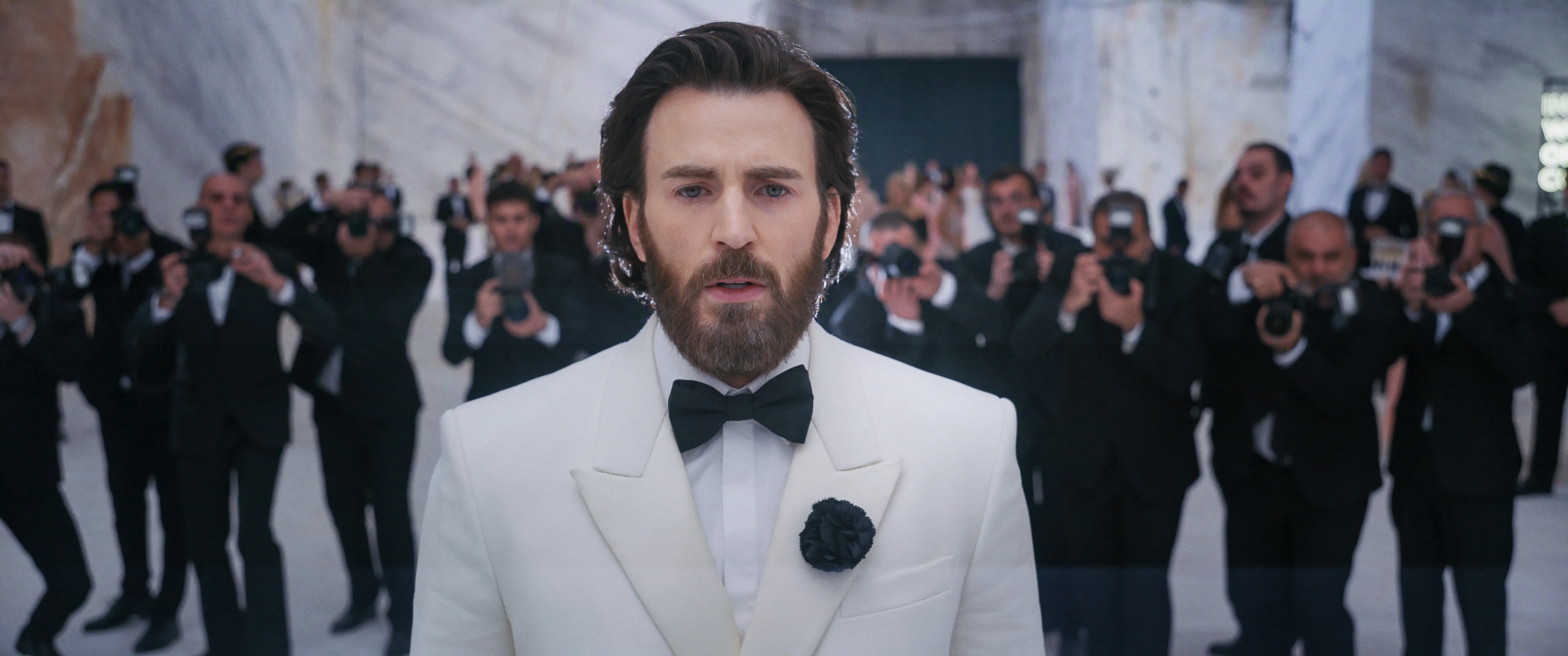 Chris Evans in front of photographers in Sacrifice movie